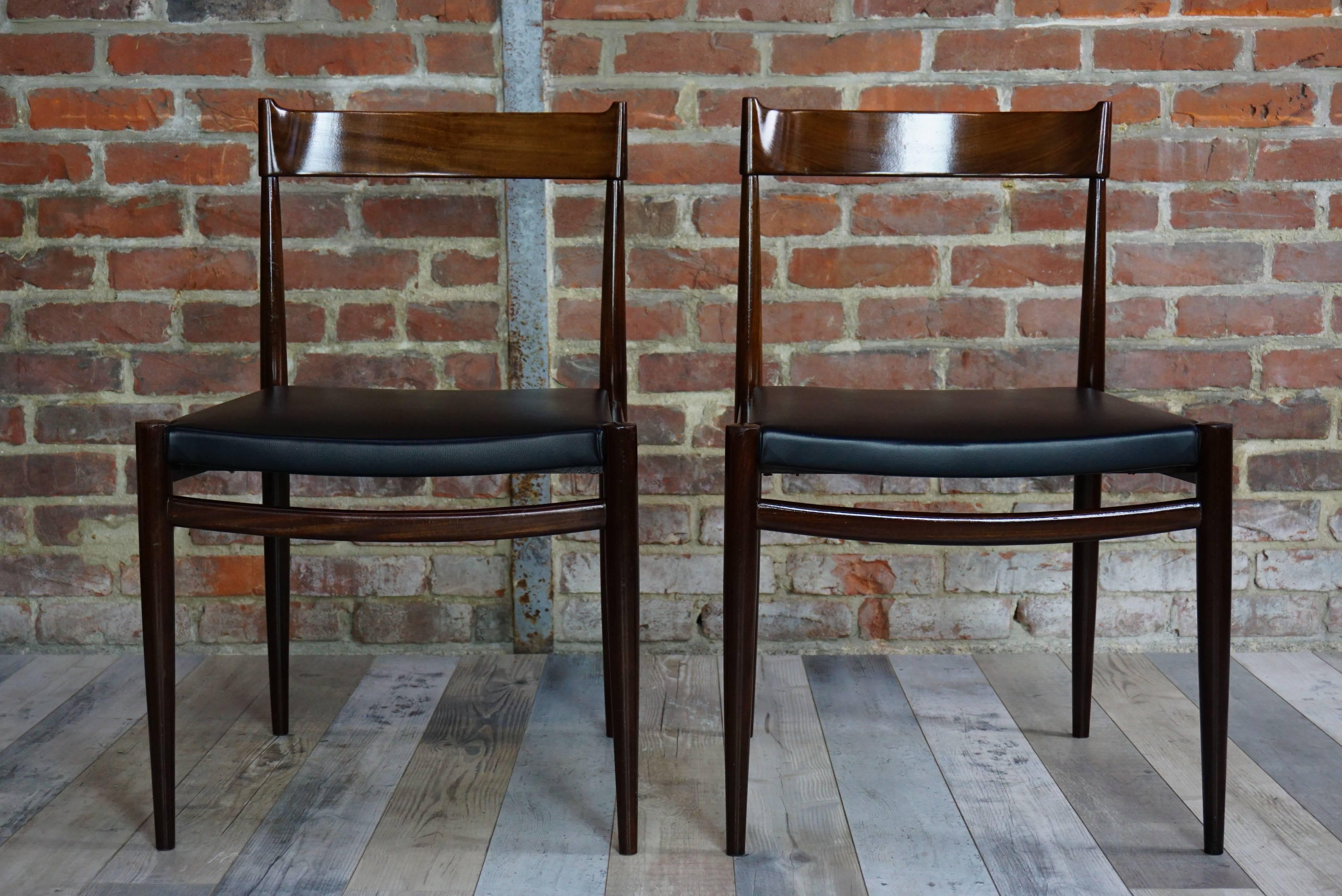 European Pair of Teak Chairs and Faux Black Leather Design from the 1950s