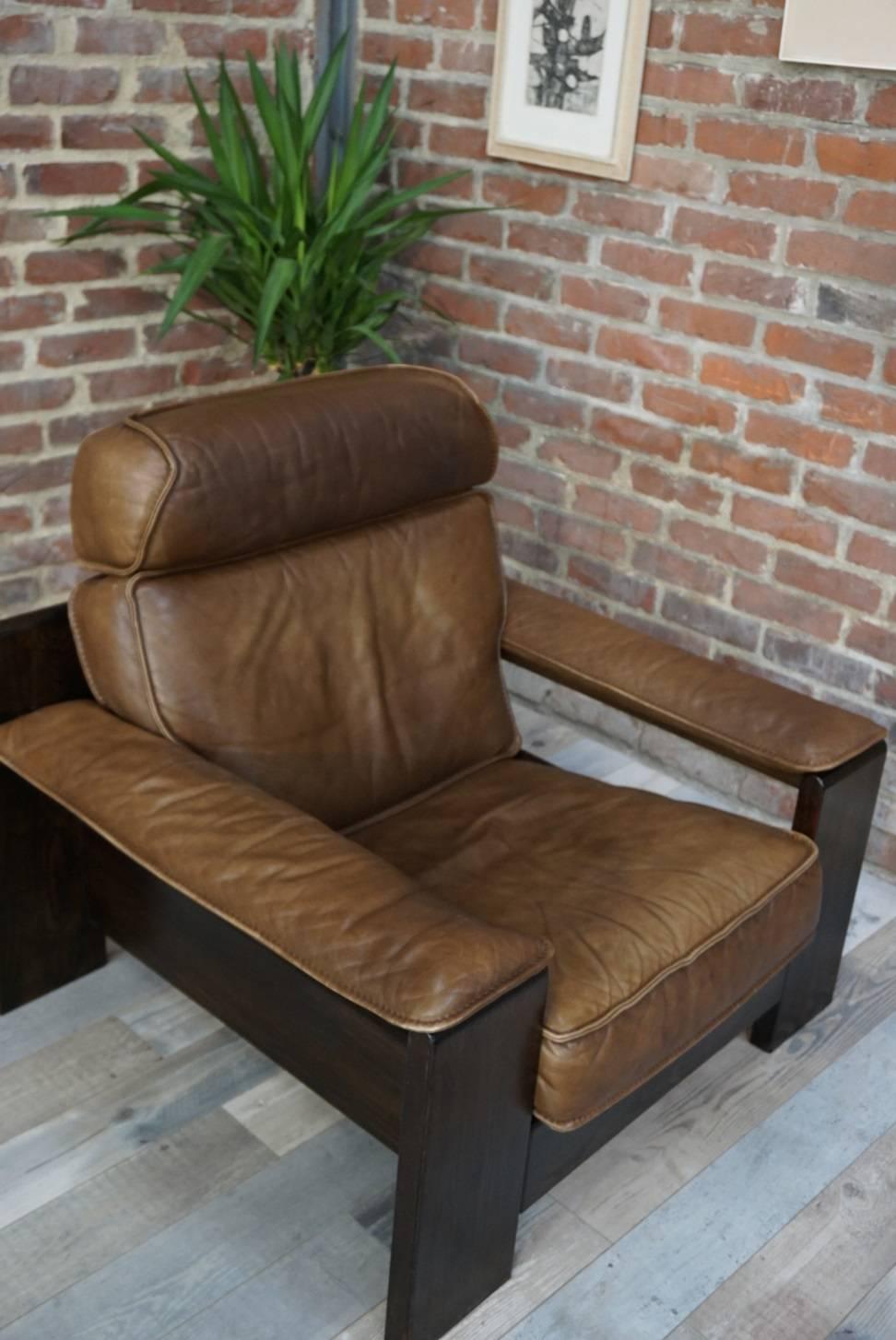 Rare and magnificent leather armchair made by Harry De Groot for Leolux, design of the 1950s only noble materials: solid oak, high quality leather. Beautiful patina and so comfy!