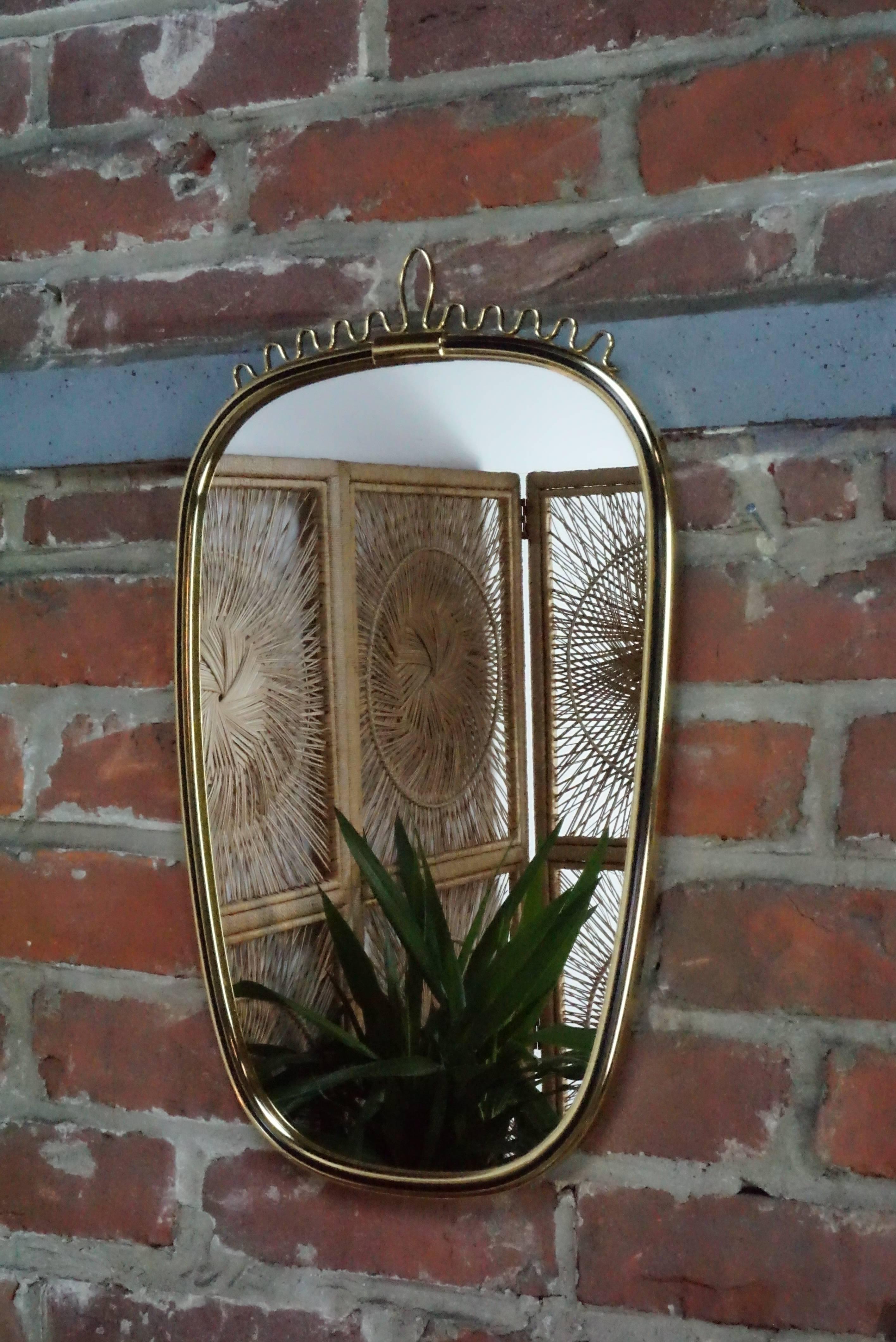 Italian Design Of The 50's Brass Mirror at the manner of Gio Ponti and in excellent state of conservation
