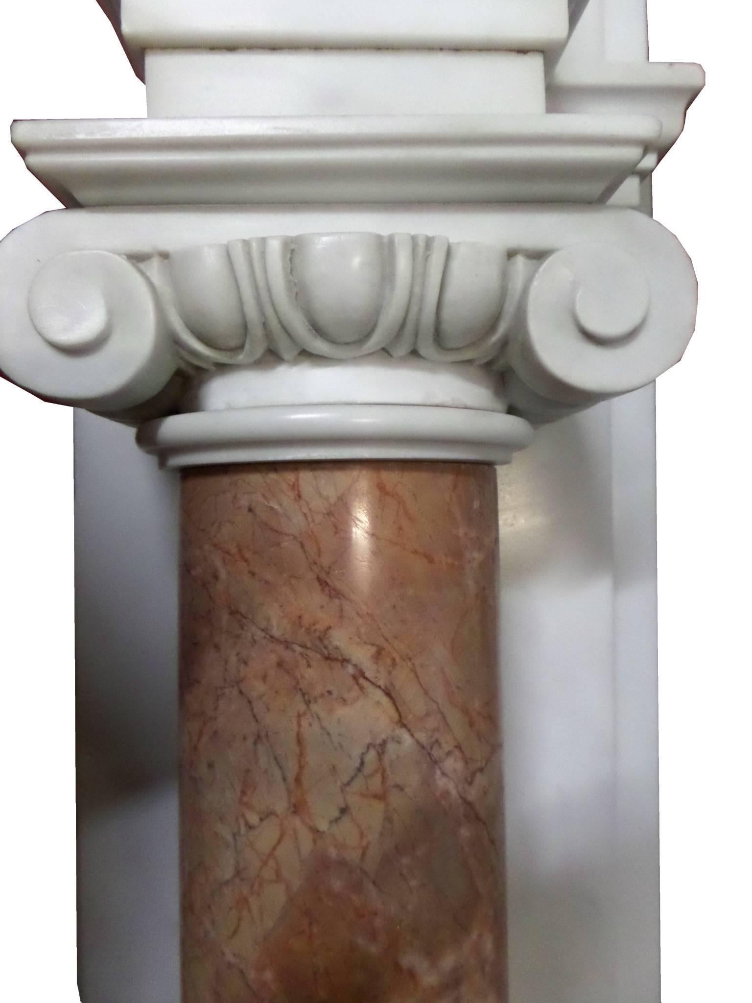 Carved 20th Century Regency Statuary Marble Chimneypiece with Rosa Marble Pillars For Sale