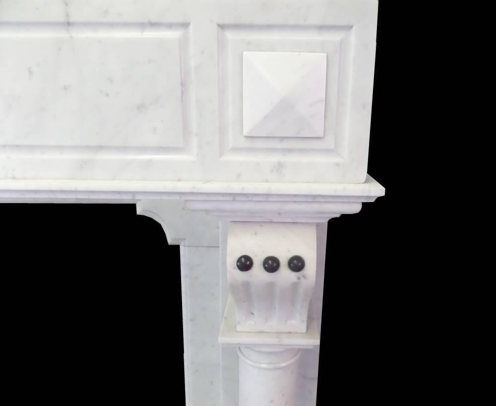 Antique restored 20th century Arts and Craft. Measures: Tall (61" high) continental (Probably Belgium/French origin) Carrara marble surround. Two large pillars support the corbals and large shelf, circa 1900.
Removed from a property in