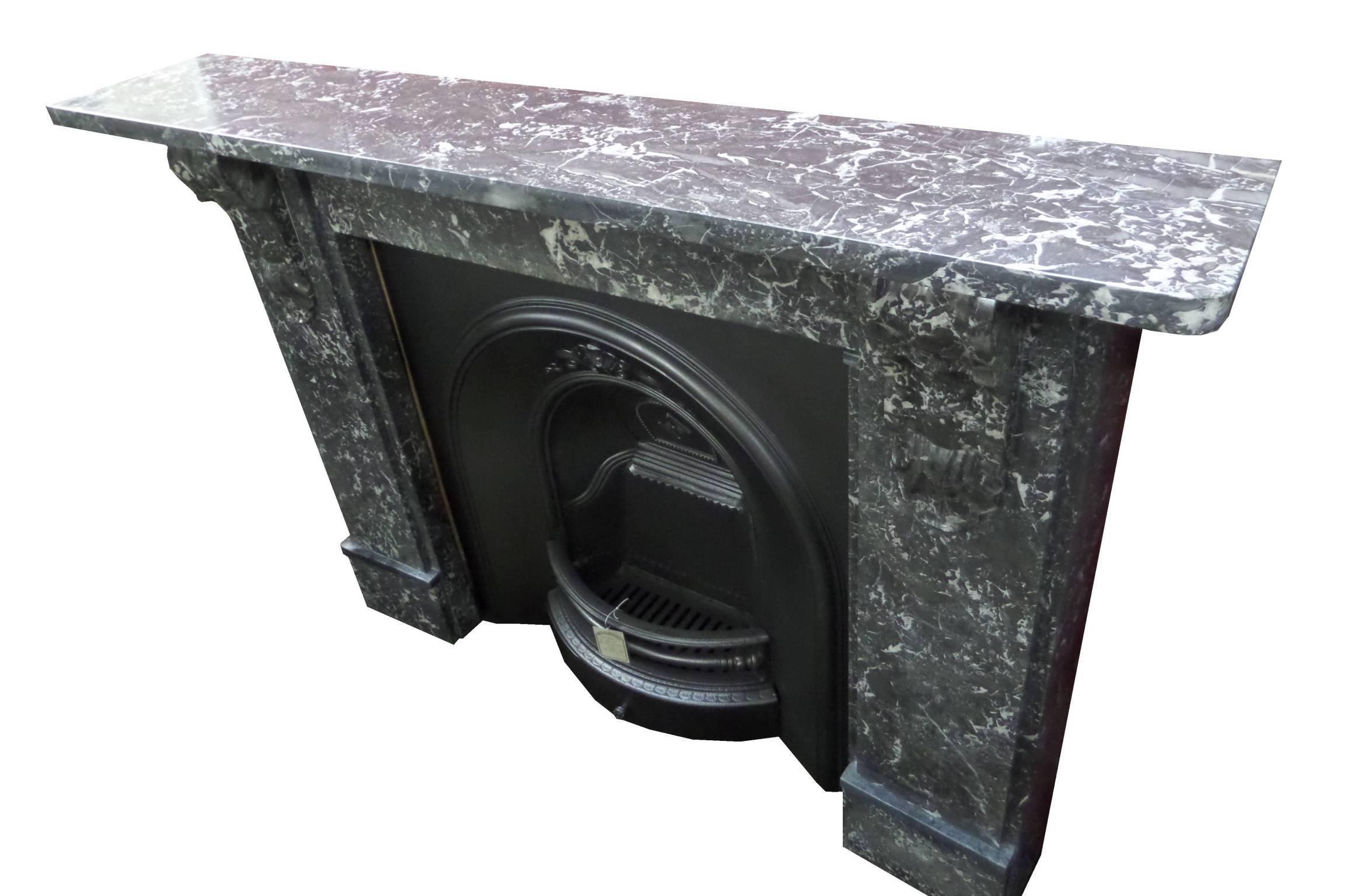 Antique restored Victorian black St. Anne's Marble Mantel / Surround, circa 1880-1890. The sea shell corbel is to a high standard and finely detailed .Opening width and leg to leg can be adjusted by design on installation.
 