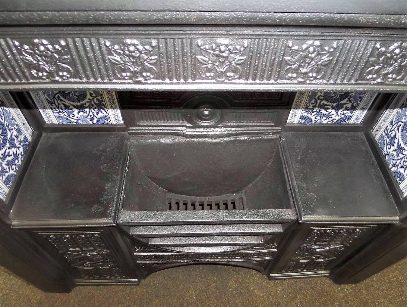 Antique 19th century Victorian hob grate fireplace Insert with William Morris antique Tiles. The hob grate is finished in a traditional black polish and complete with a chimney isolation damper plate. Dimensions are on the last picture.