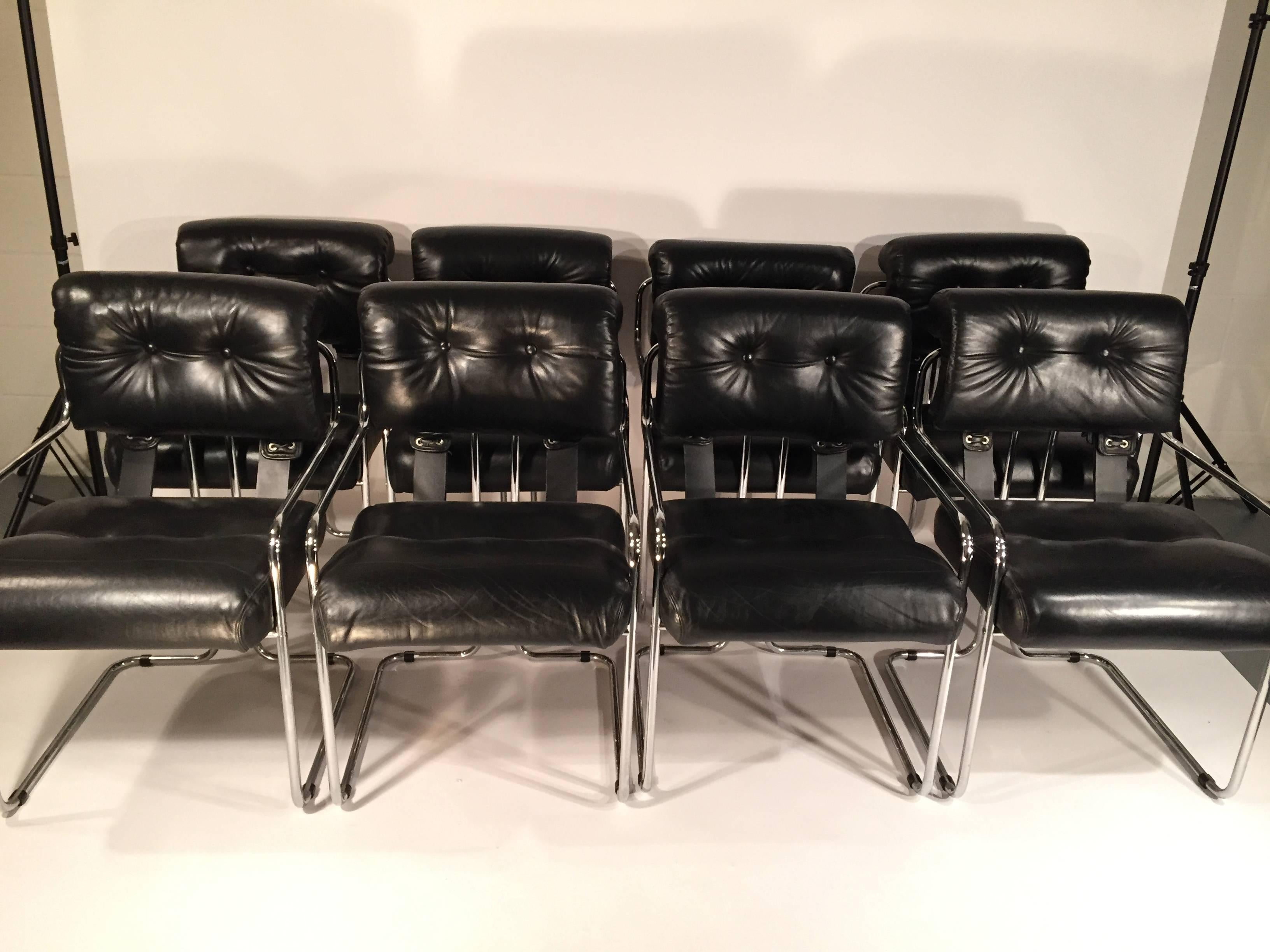 Set of eight black leather and chrome pace collection dining chairs, Italian, 1970s.