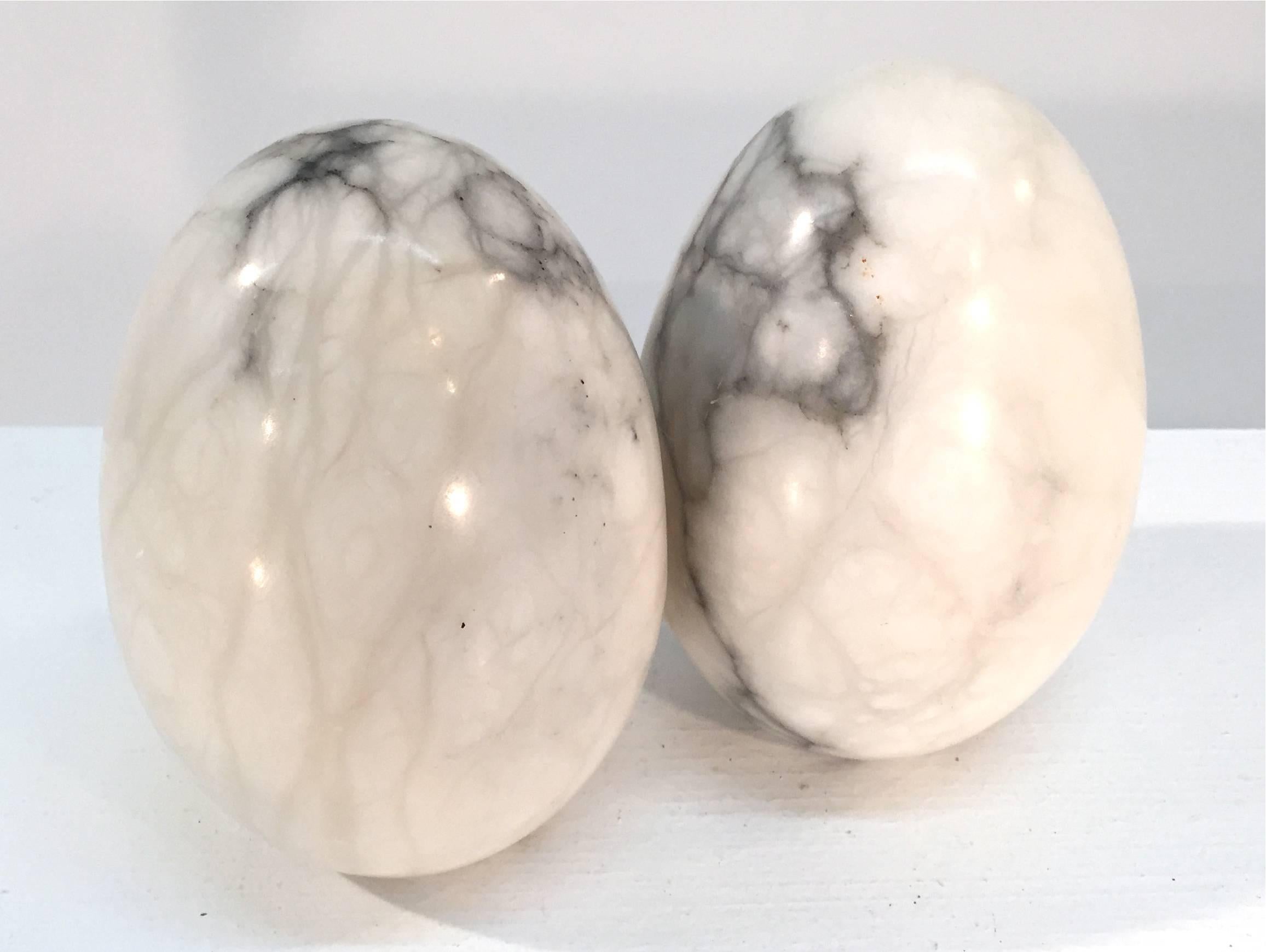 Pair of egg-shaped marble bookends, Italy, 1960s.