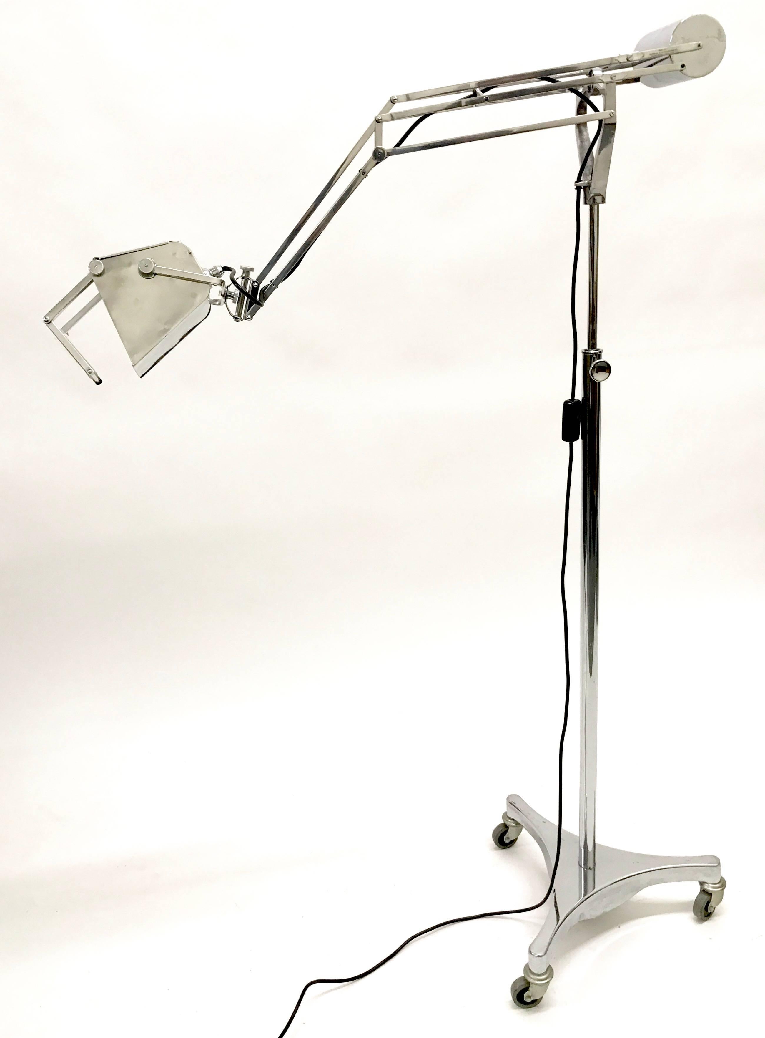 Hadrill and Horstmann counter balance trolley floor lamp with a magnifying lens, 1950s.