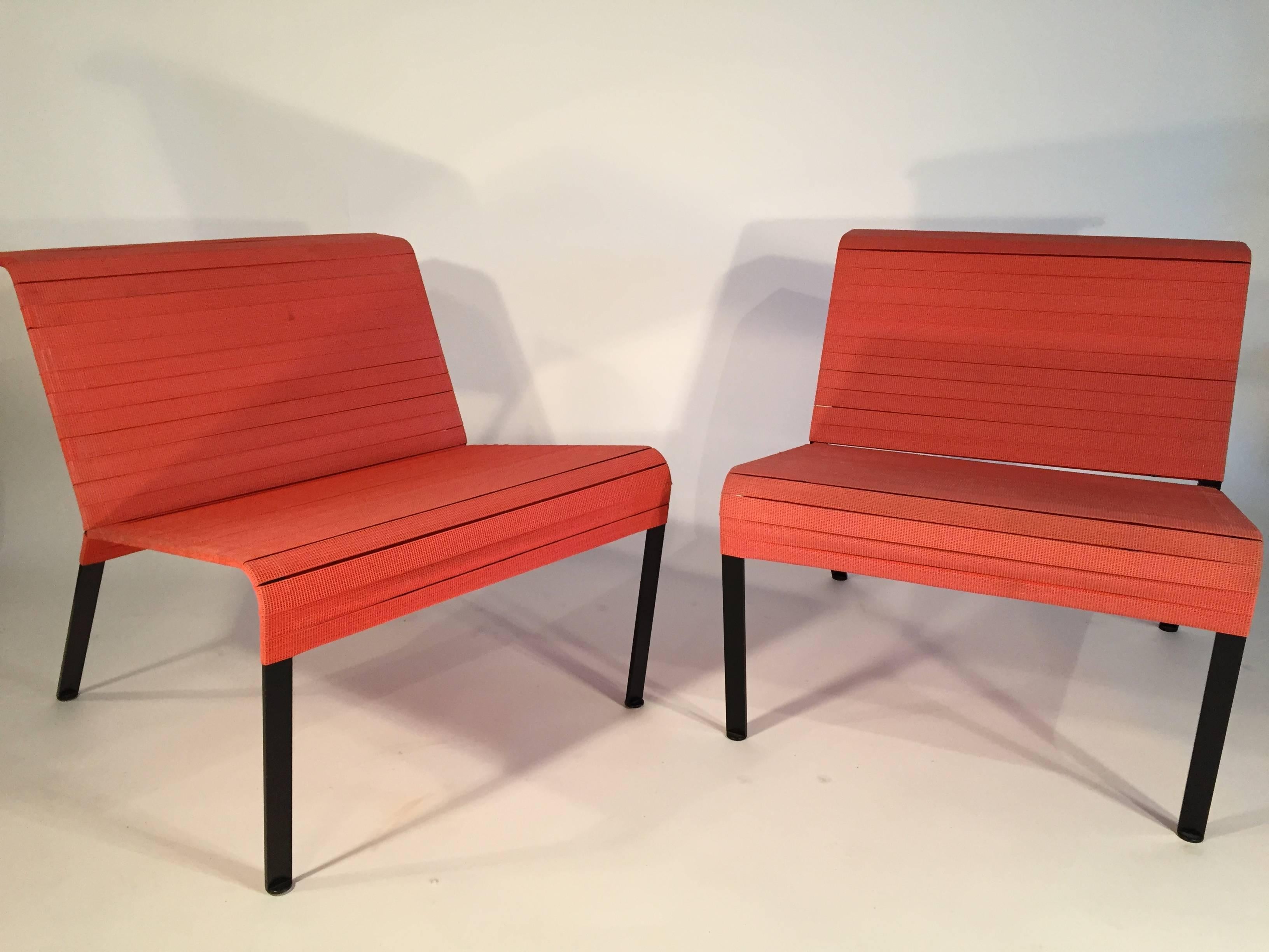 Lounge chairs with a heavy steel flat bar frame with elastic strap webbing, Italian, 1980s.