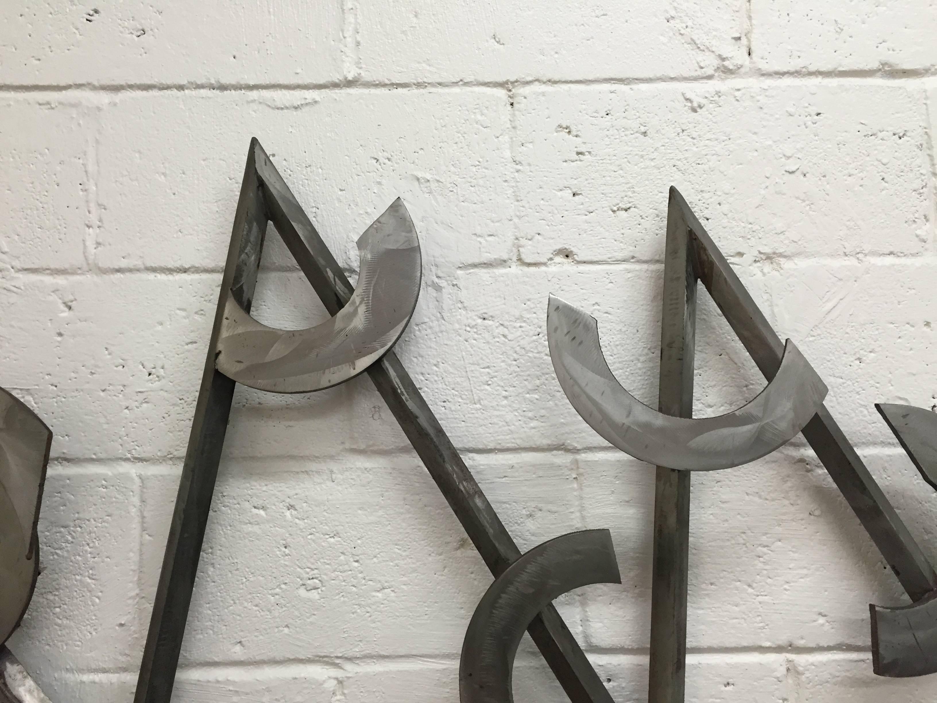 Postmodern Steel Wall Sculpture In Good Condition For Sale In Lake Success, NY