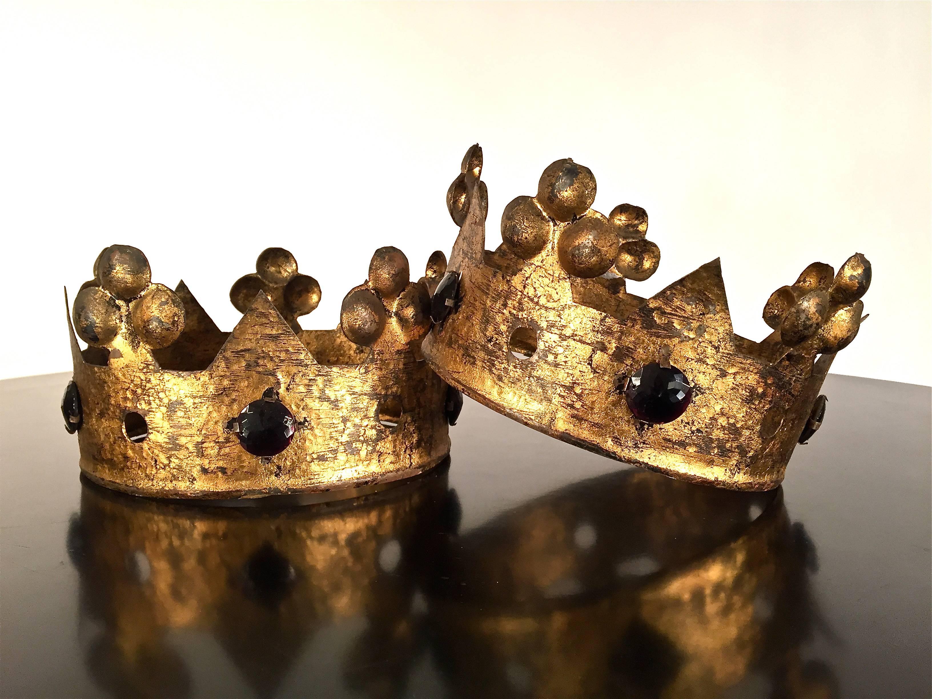 Pair of gold gilt metal crowns with glass jewel decoration, Italian, 1950s.