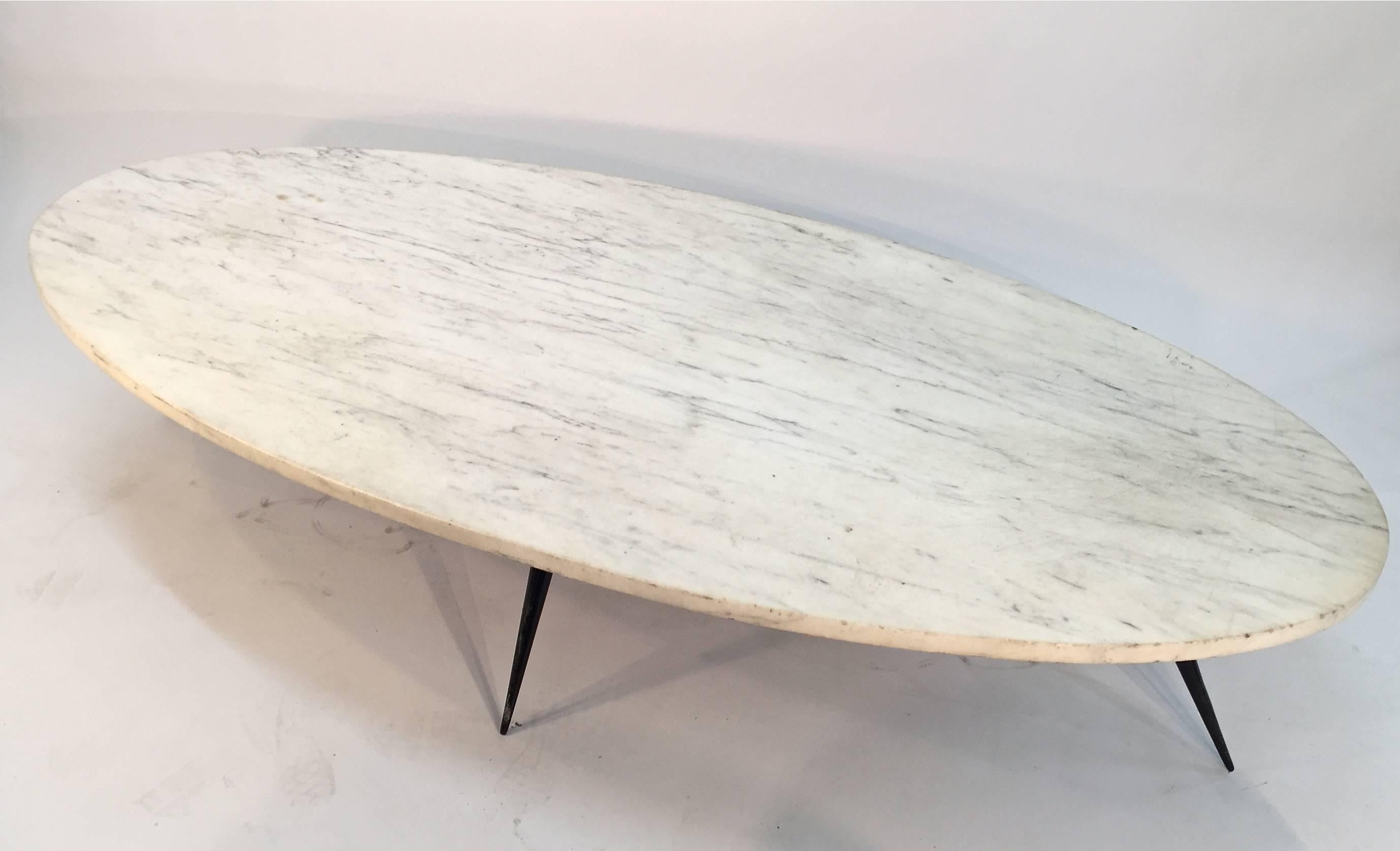 Marble-top coffee table with sculptural metal legs, 1950s.