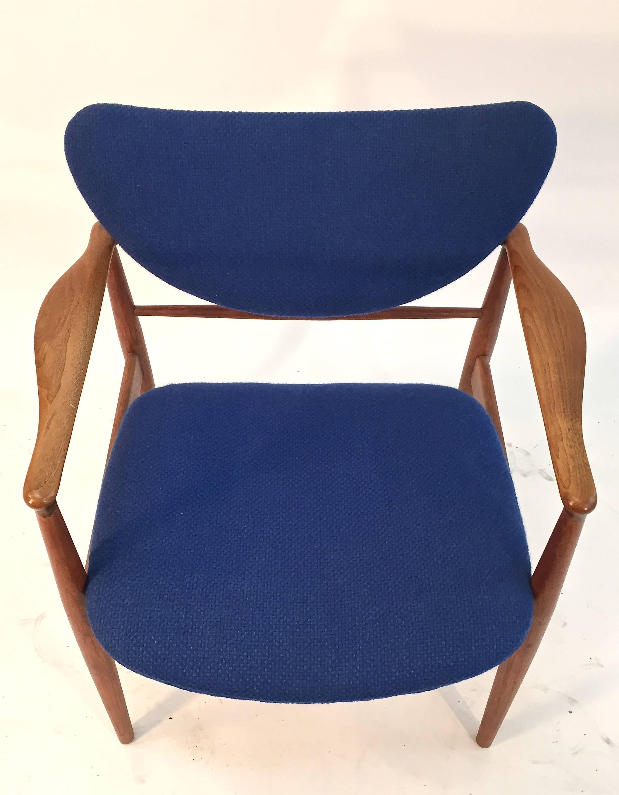 Finn Juhl model 48 walnut open armchair for Baker, 1960s.