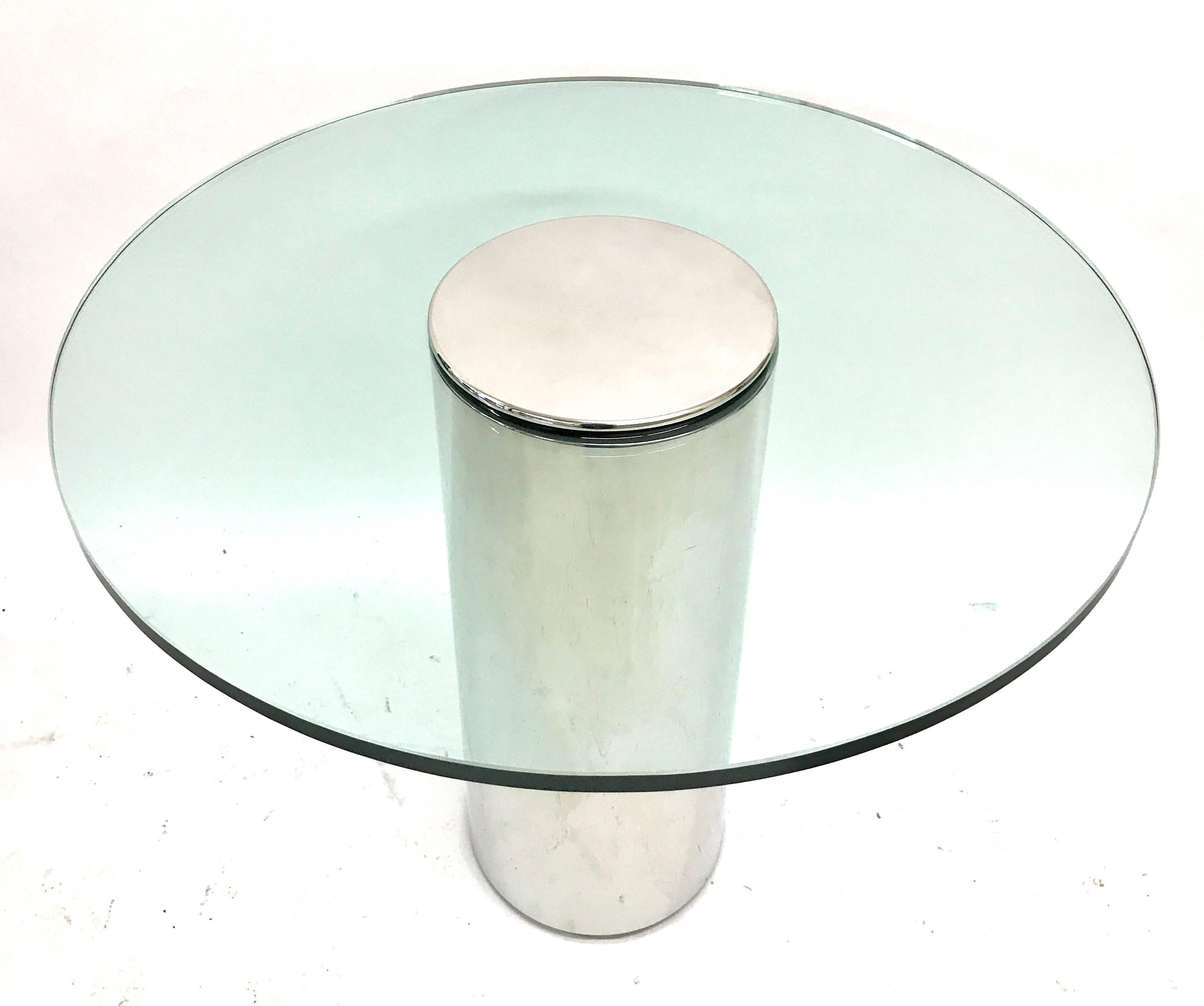 Stainless steel cylinder base game or center table with a glass top, USA, 1970s.