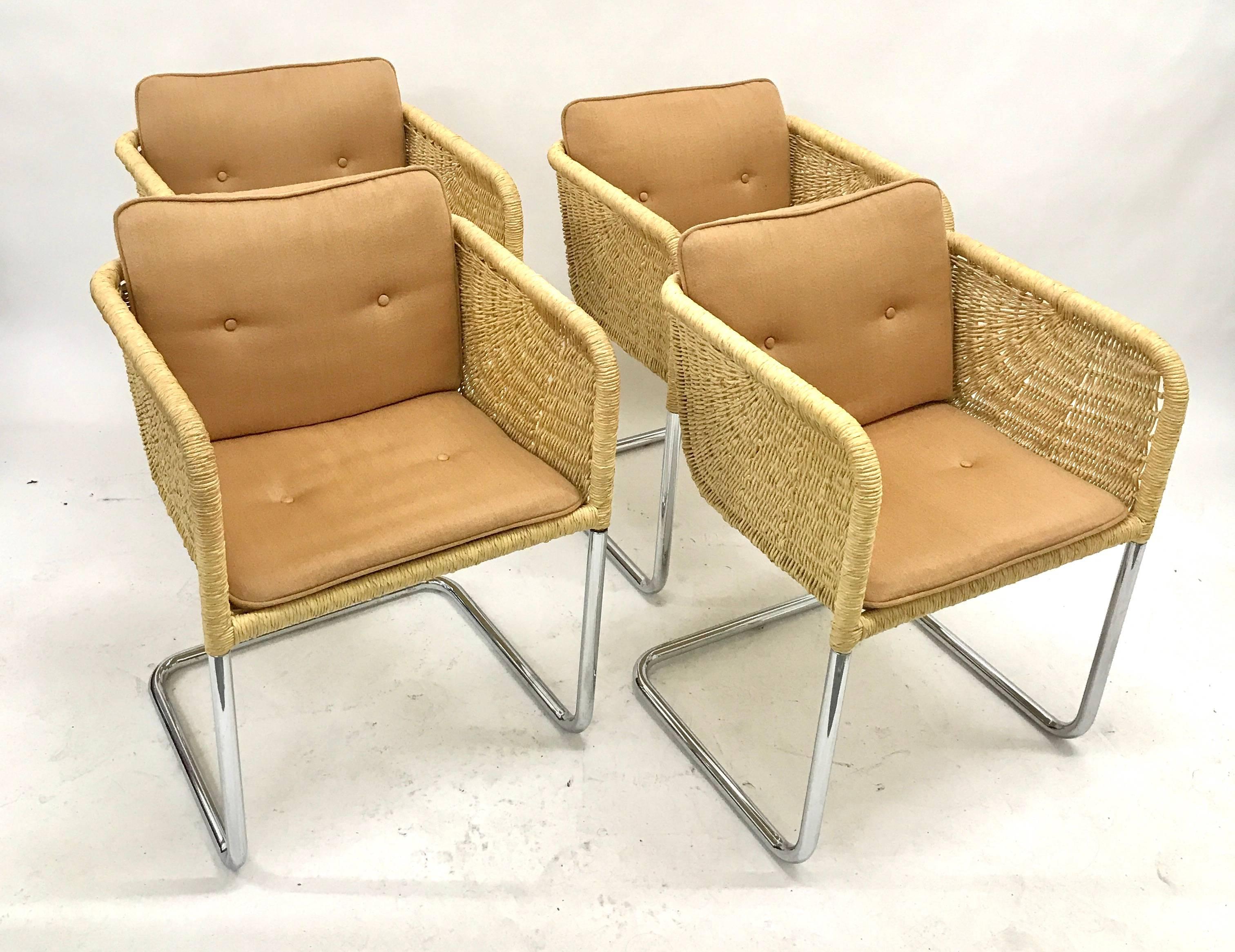 Set of four wicker and chrome cantilever chairs by Harvey Probber, 1970s. The arm height is 27