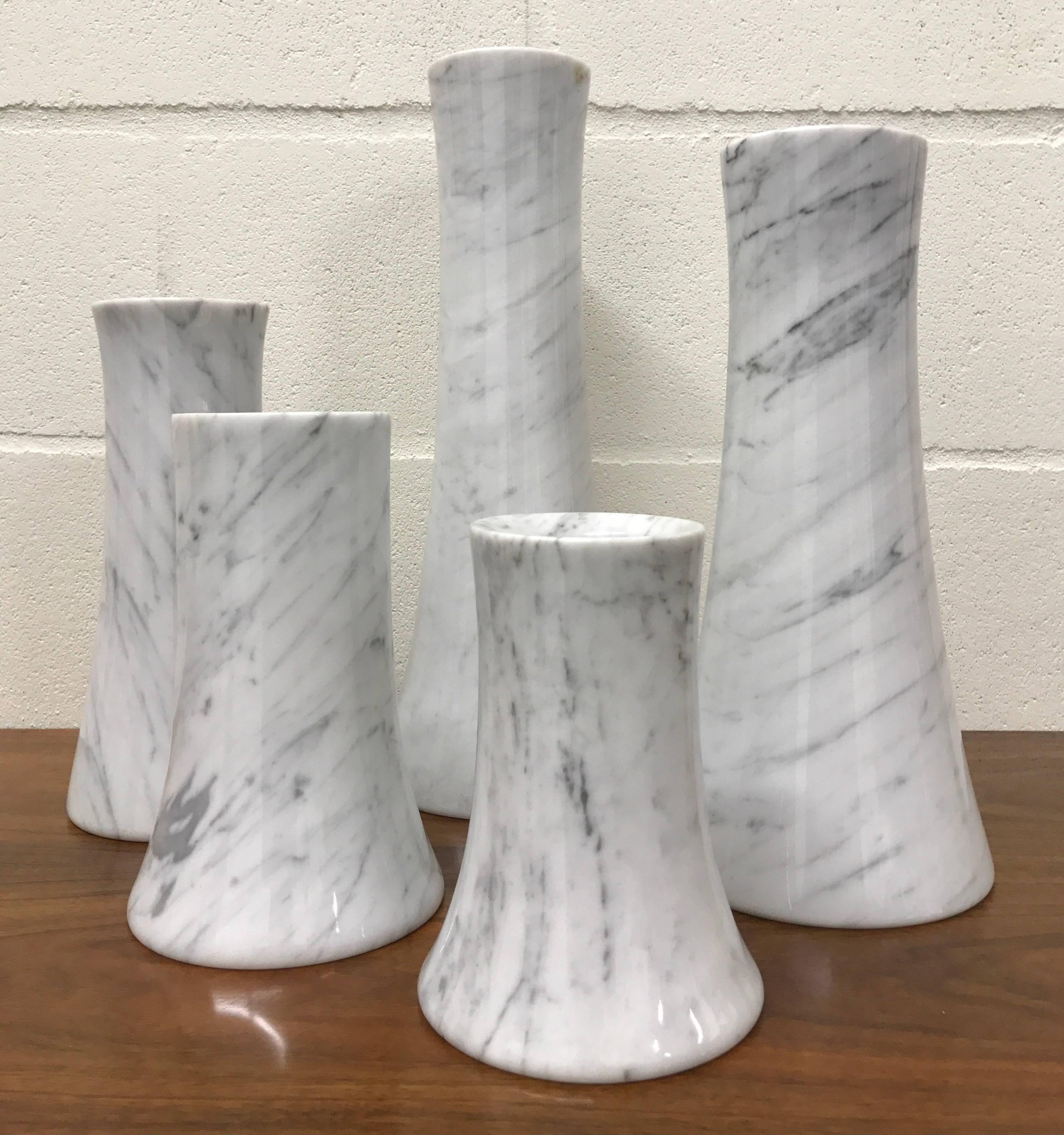 Five Italian marble vases by Angelo Mangiarotti, 1970s.

Measures: 15" H
12.50" H
10.25" H
8" H
6.50" H.