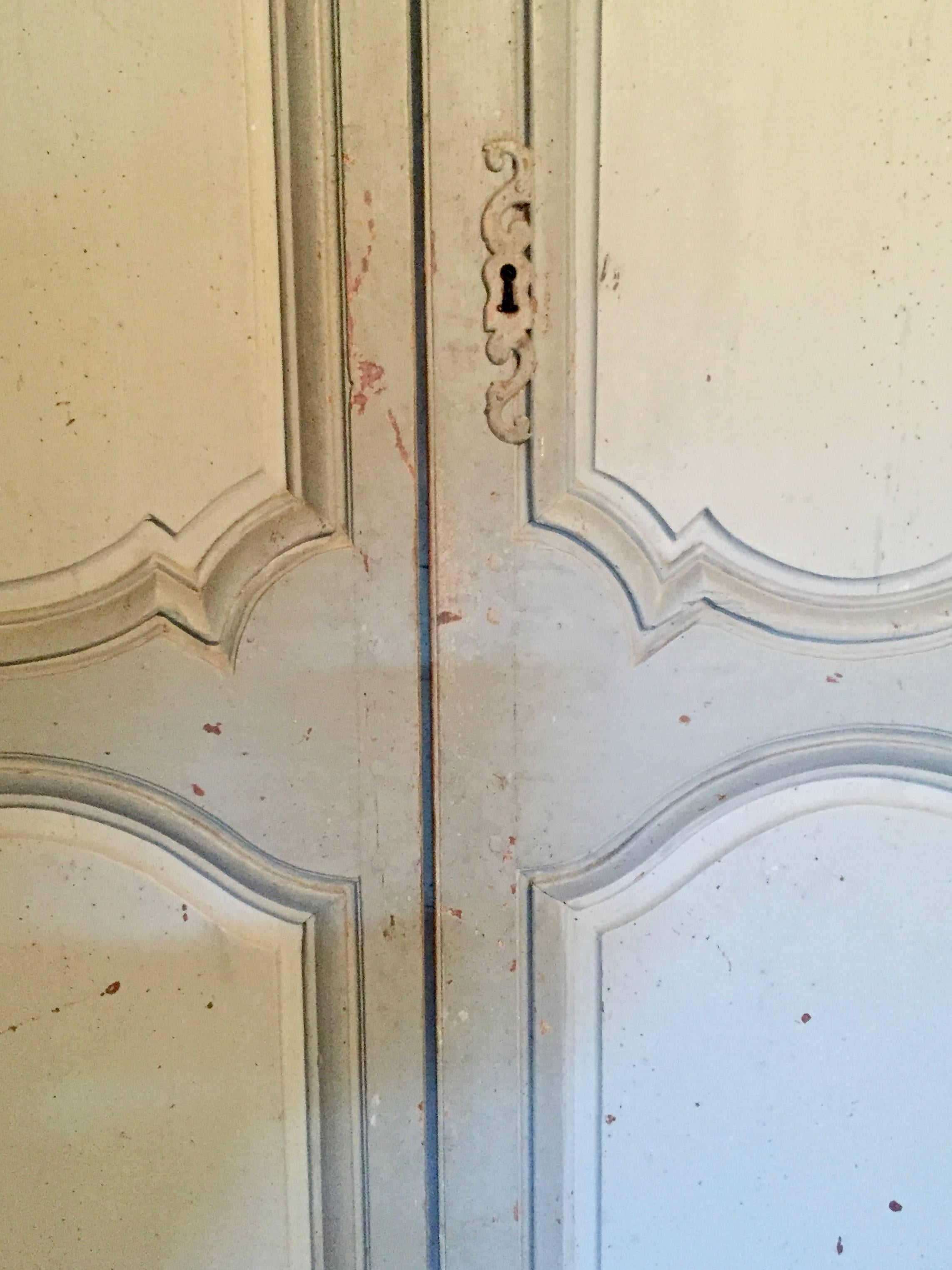 This painted cupboard comes from a South of France property. It was set in the orangerie.