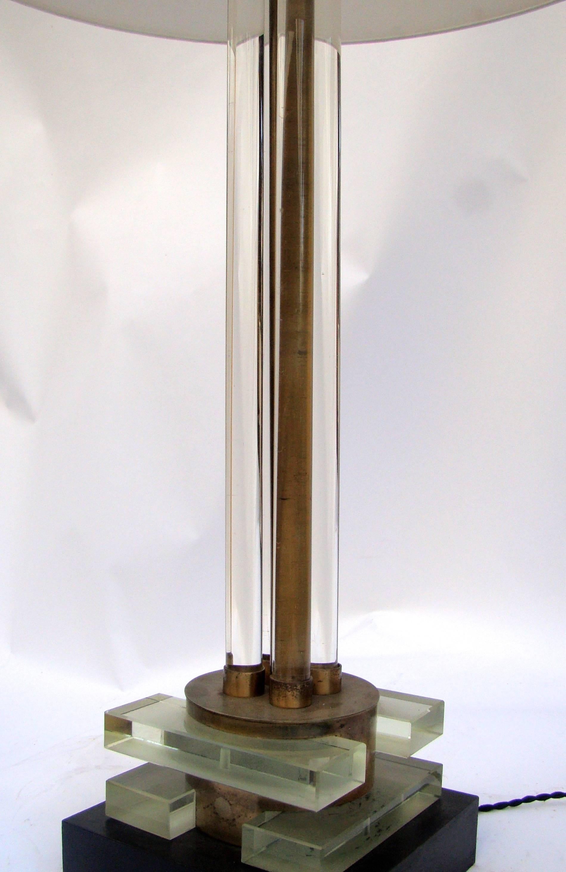 Original lamp in glass and bronze with an electric lighting system inside the base, circa 1930, France.