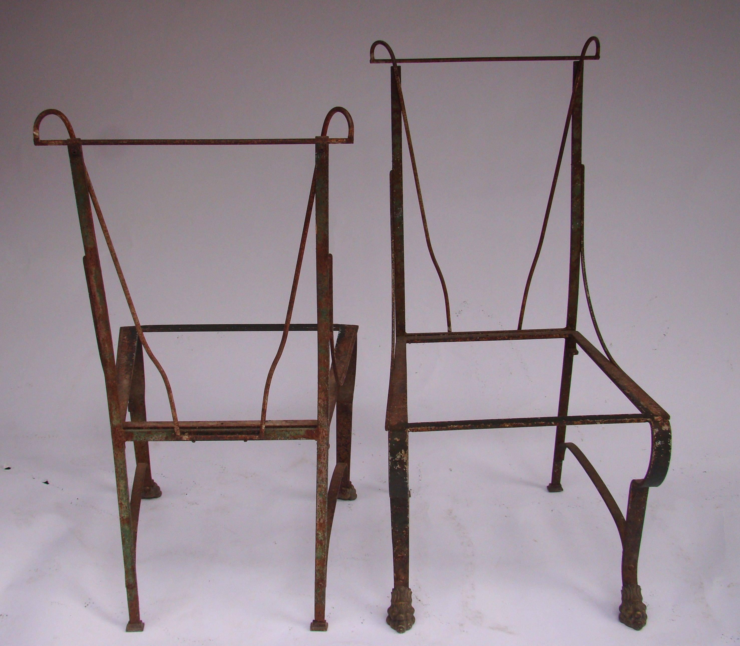 Original set of four chairs in wrought iron with a lion pattern foot. 
Provincial work from the south of France.