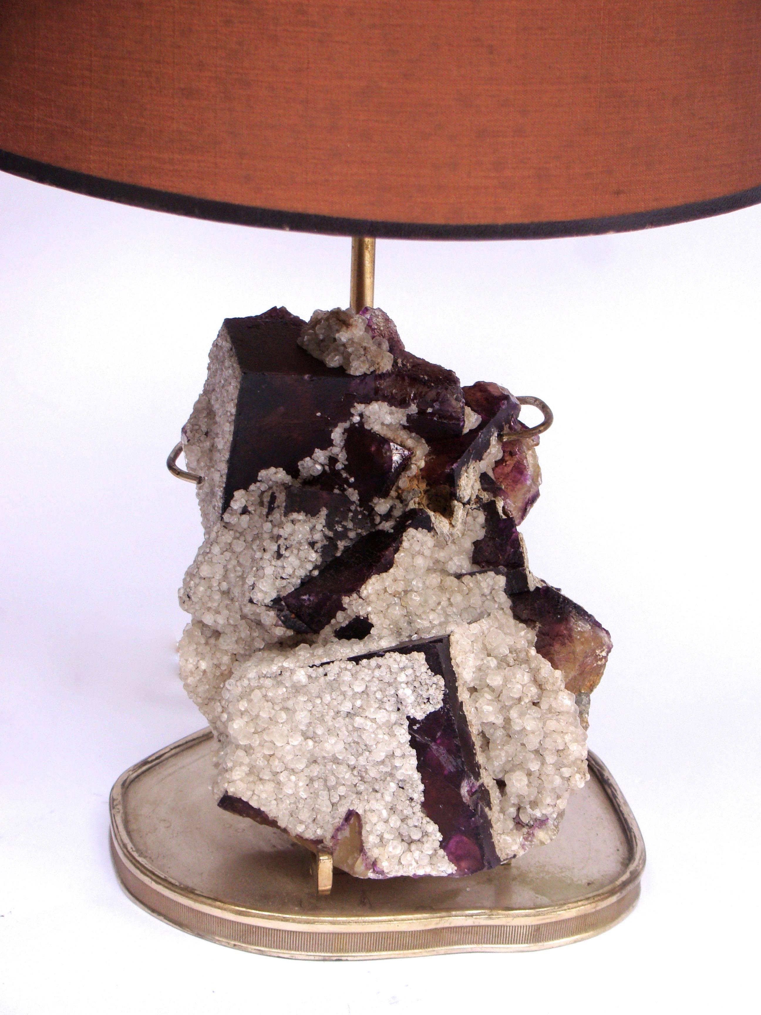 Original table lamp decorated with a large mineral stone, circa 1950.