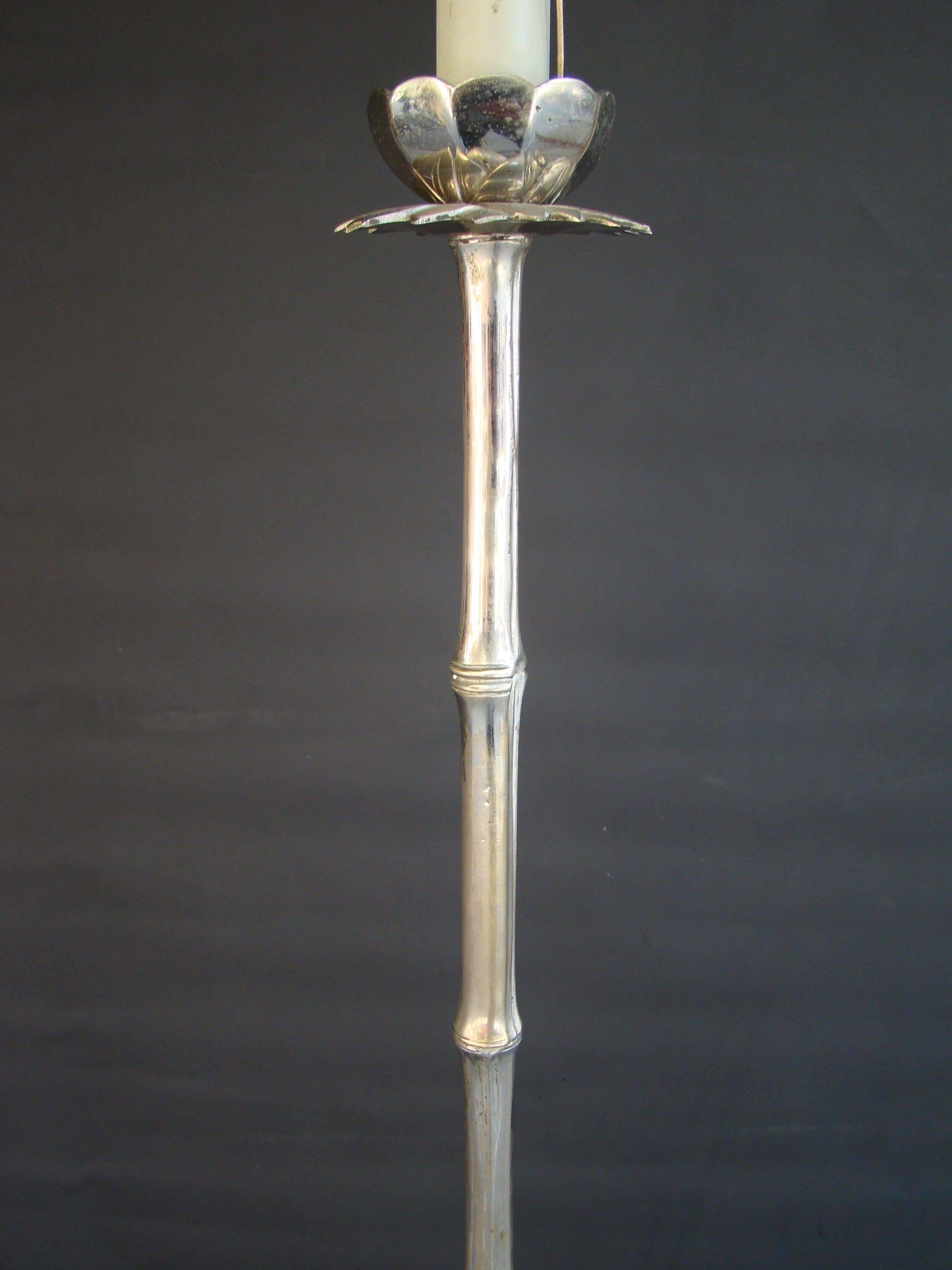 Handsome silvered bronze tripod floor lamp decorated with a faux bamboo with a palmtree topic by Maison Baguès, circa 1960.