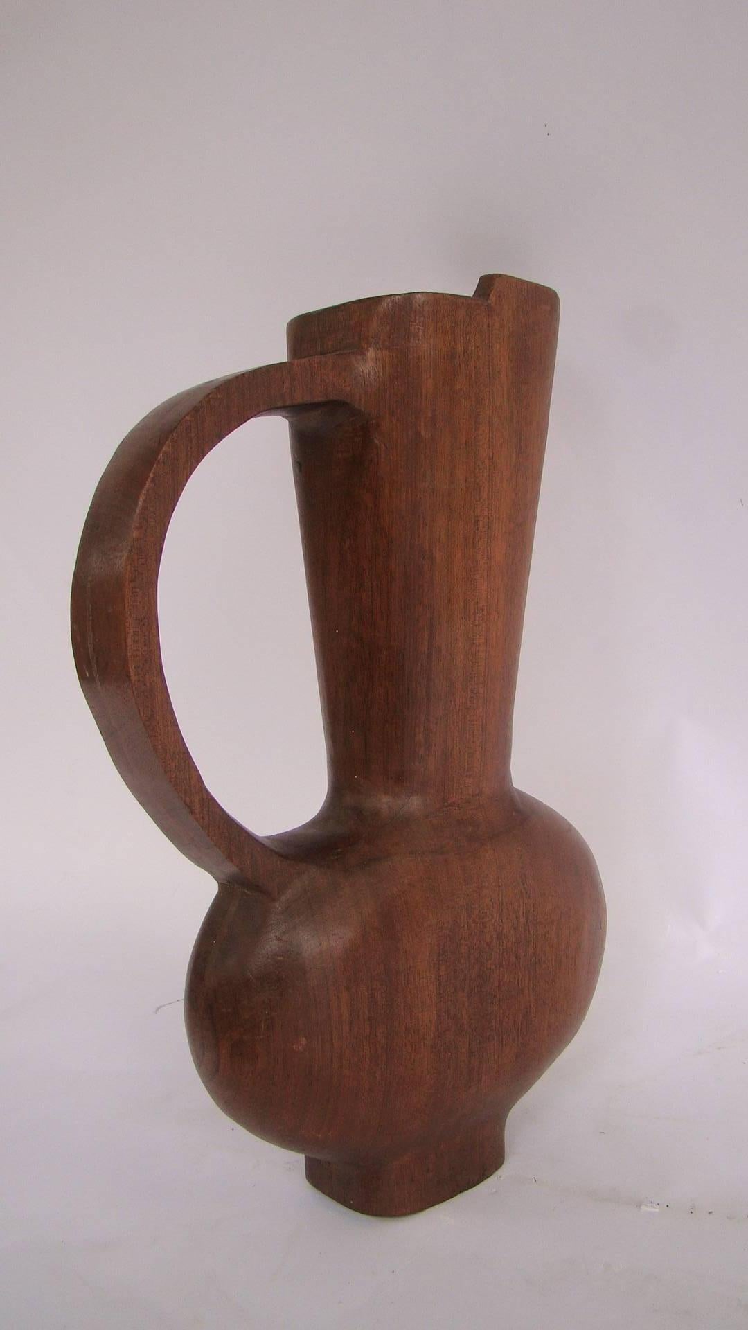 Mahogany wood jug, 1950s, France.