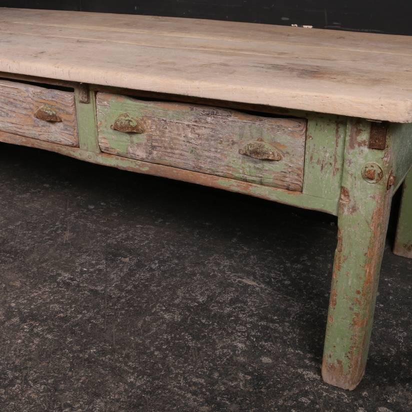 Amazing 19th century serving table. This table came out of a large country house in Sussex. It has a wonderfully worn original green paint and a fantastic 1.75 inch (4.5cm) thick bleached sycamore top. 1840.

Dimensions
96 inches (244 cms)