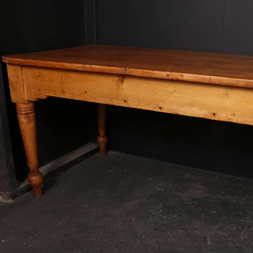Huge antique pine farmhouse table, 1840

Clearance under the rail is 25 inches (63cm)

Dimensions:
128.5 inches (326 cms) wide
34.5 inches (88 cms) deep
32 inches (81 cms) high.

       