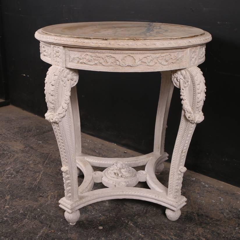Pretty 19th century French carved lamp table, 1890. 

Dimensions:
30 inches (76 cms) high
30 inches (76 cms) diameter.

       