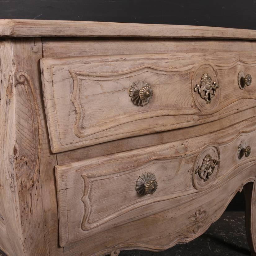 Wonderful 18th century French bleached oak bombé commode, 1780

  

Dimensions
34 inches (86 cms) wide
18.5 inches (47 cms) deep
31 inches (79 cms) high.

 