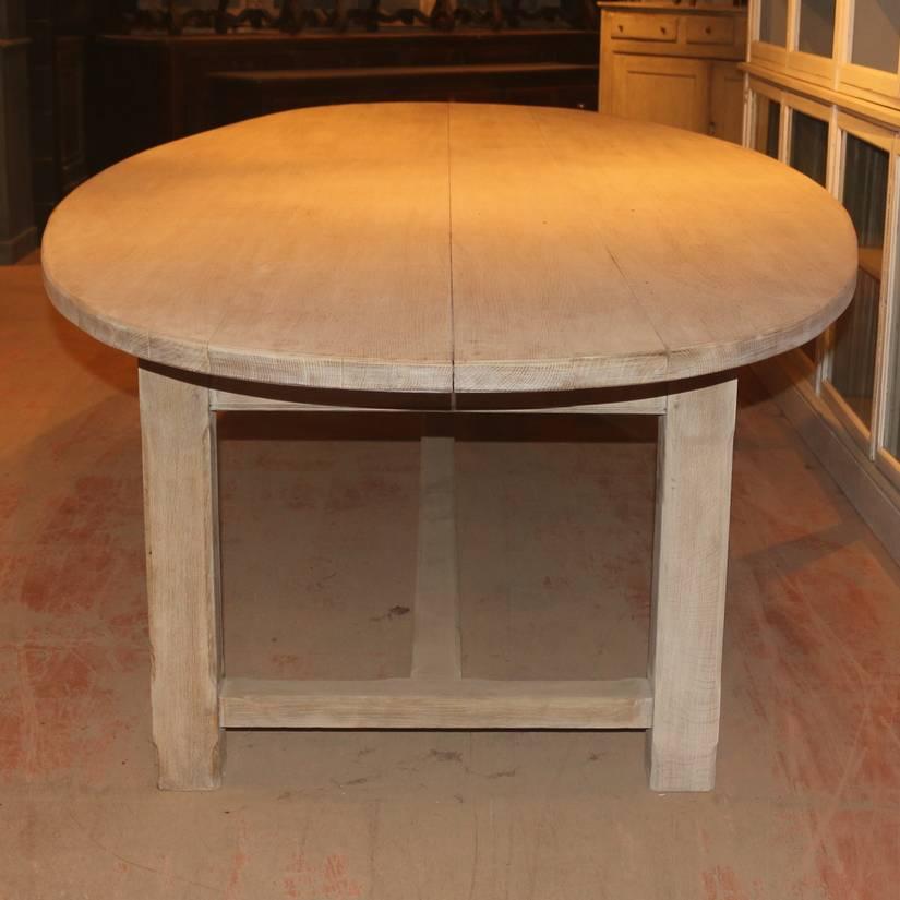Magnificent 19th century French bleached oak oval dining table with a 1.5