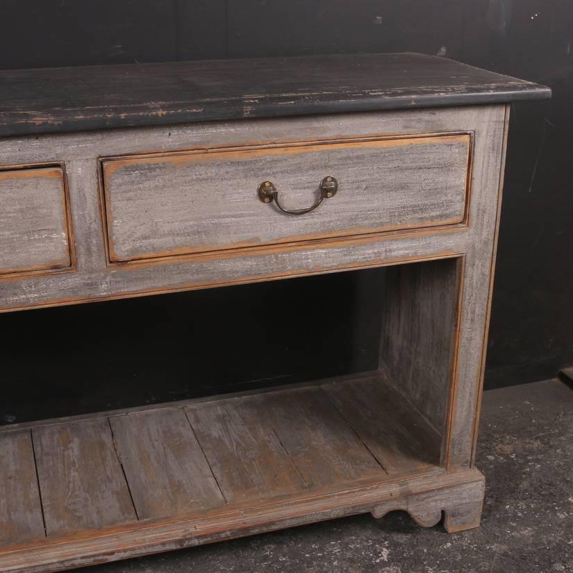 Large painted 19th century English dresser base, 1840.

Reference: 4886

Dimensions
89 inches (226 cms) Wide
19 inches (48 cms) Deep
36.5 inches (93 cms) High.