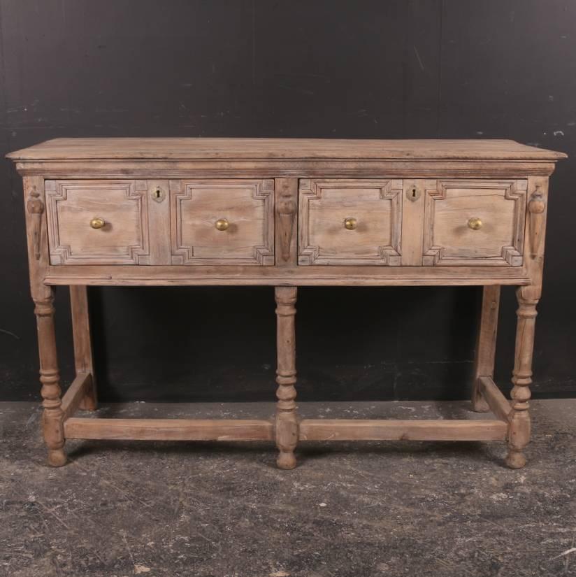 Small 19th century English bleached oak serving table, 1860.

Dimensions
56 inches (142 cms) wide
19.5 inches (50 cms) deep
34.5 inches (88 cms) high.

            