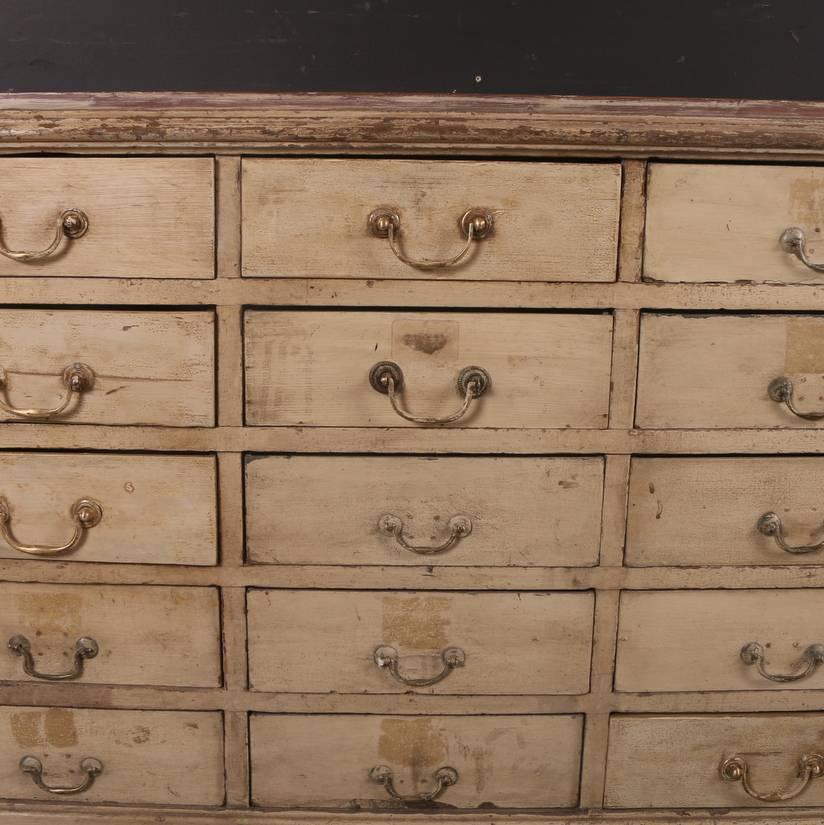 Late 19th century French base of 30 drawers in an old worn cream paint, 1890

  

Dimensions
80 inches (203 cms) wide
17 inches (43 cms) deep
33.5 inches (85 cms) high.