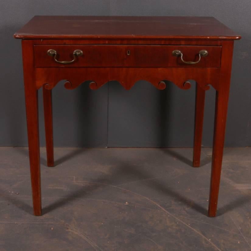 Small late 18th century mahogany one drawer lamp table, 1790

Dimensions
32 inches (81 cms) wide
18.5 inches (47 cms) deep
29.5 inches (75 cms) high.

 