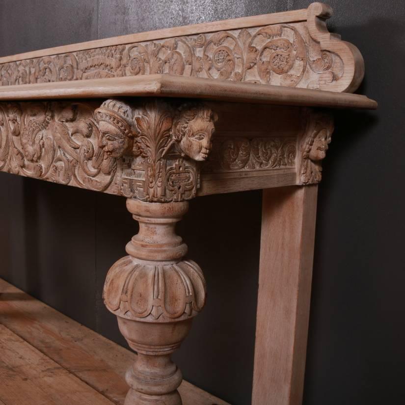 Wonderful early 19th century Italian carved and bleached oak one drawer console table, 1820.

Measure: 32