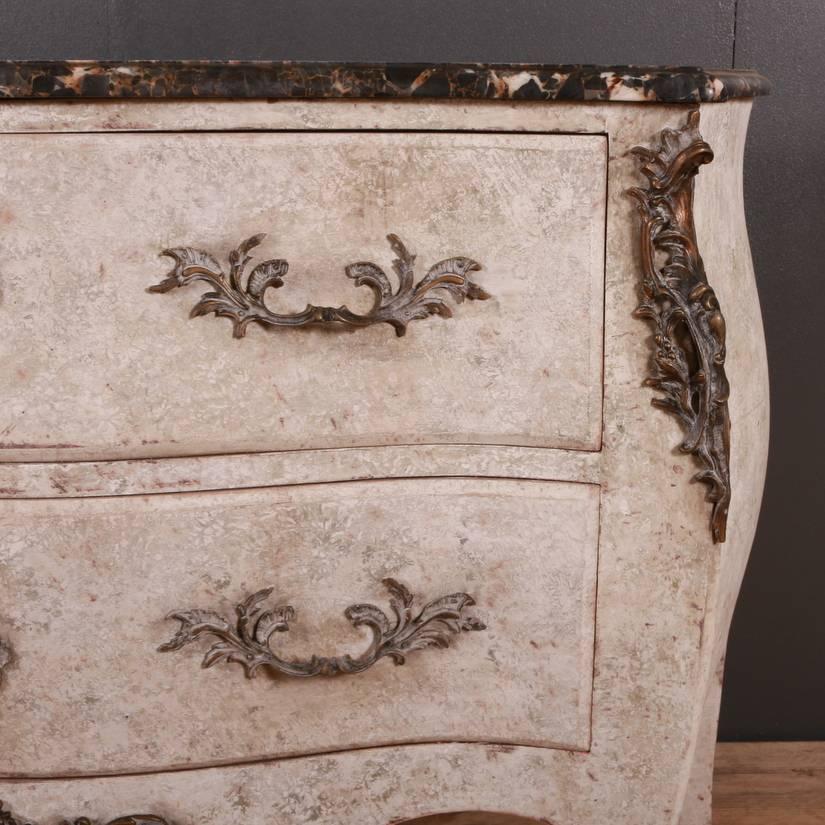 19th century painted French ormolu-mounted Rococo commode with a marble top, 1880



Dimensions:
50.5 inches (128 cm) wide
20 inches (51 cm) deep
36 inches (91 cm) high.
