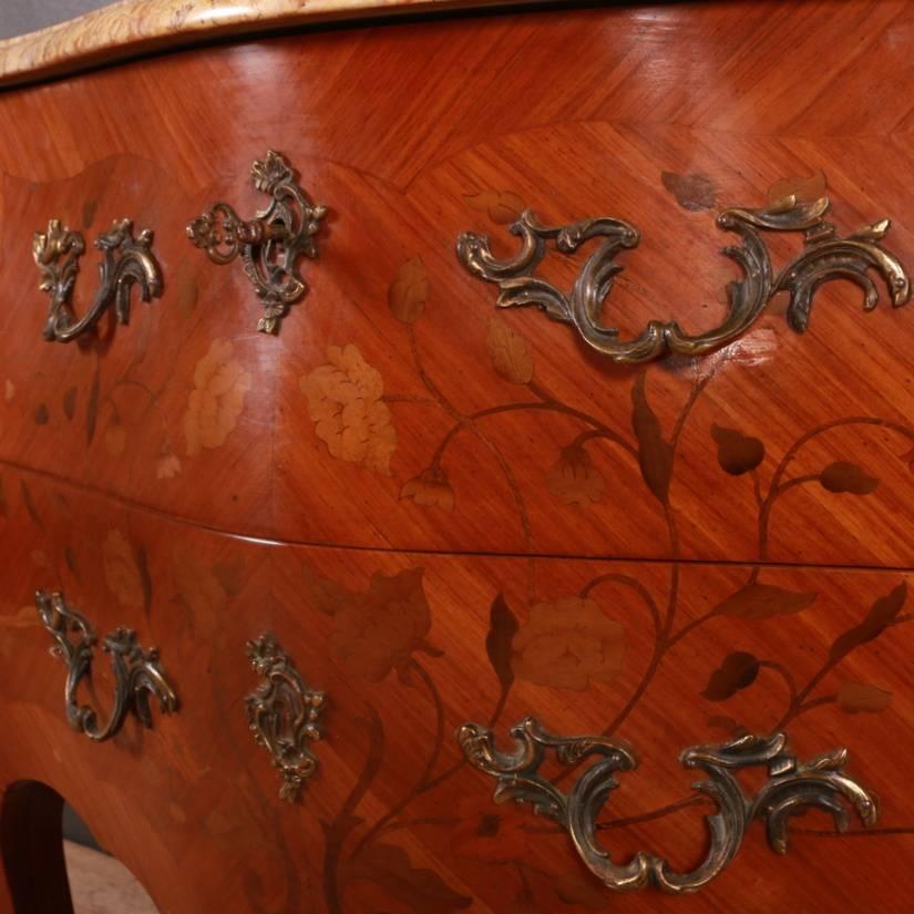 Late 19th century French bombe two-drawer marquetry commode with ormolu decoration, 1890.



Dimensions:
34 inches (86 cms) wide
18 inches (46 cms) deep
33 inches (84 cms) high.