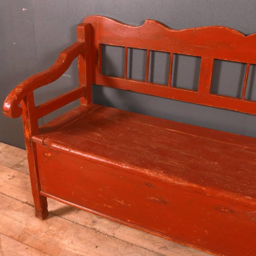 19th century original red painted farmhouse settle with a lift up lid, 1850

Seat depth 19.5