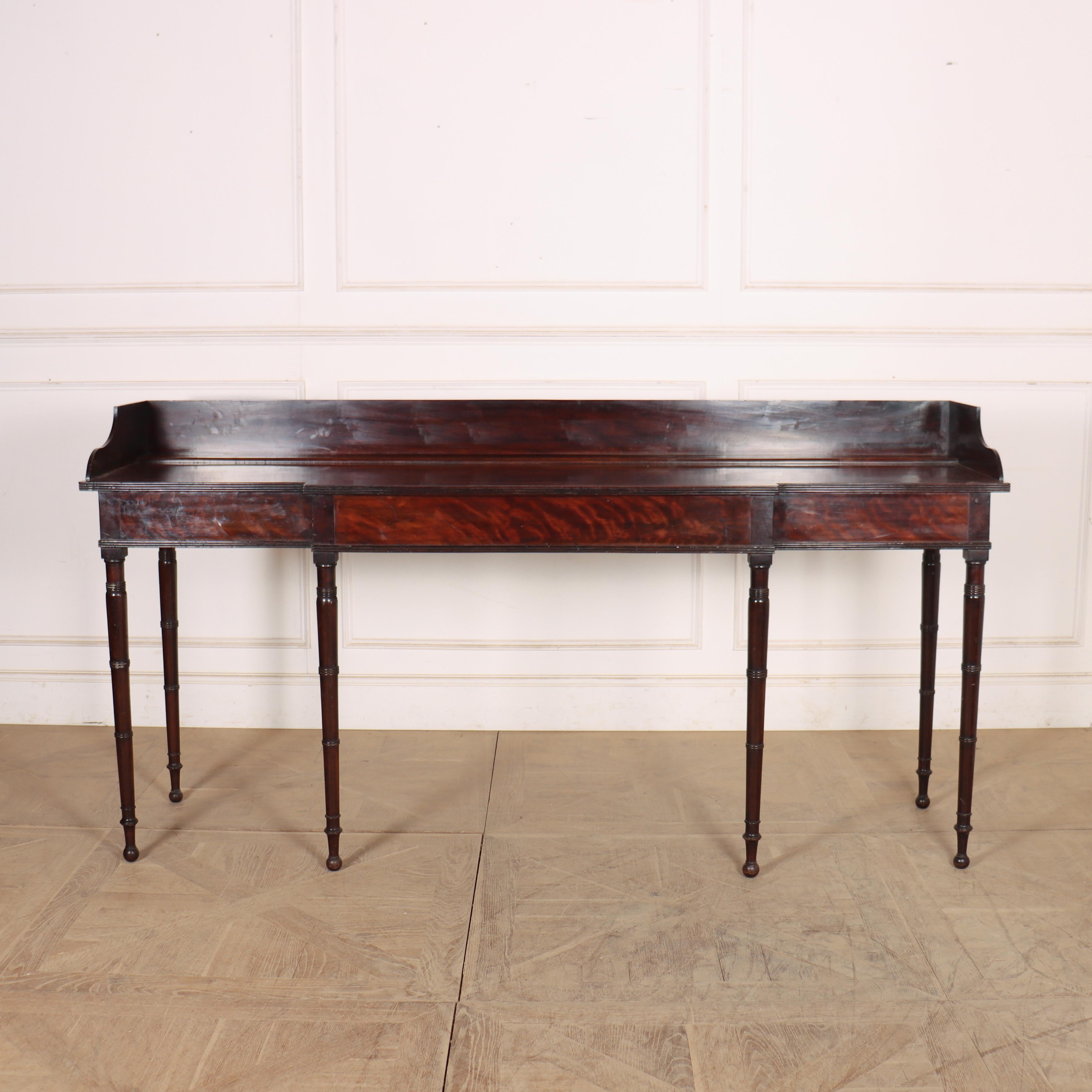 Good looking early 19th century English regency breakfront console table with wonderful figured mahogany and great colour. 1820. 

Height to top: 35-inches


Code: 8982

Dimensions:
W: 80