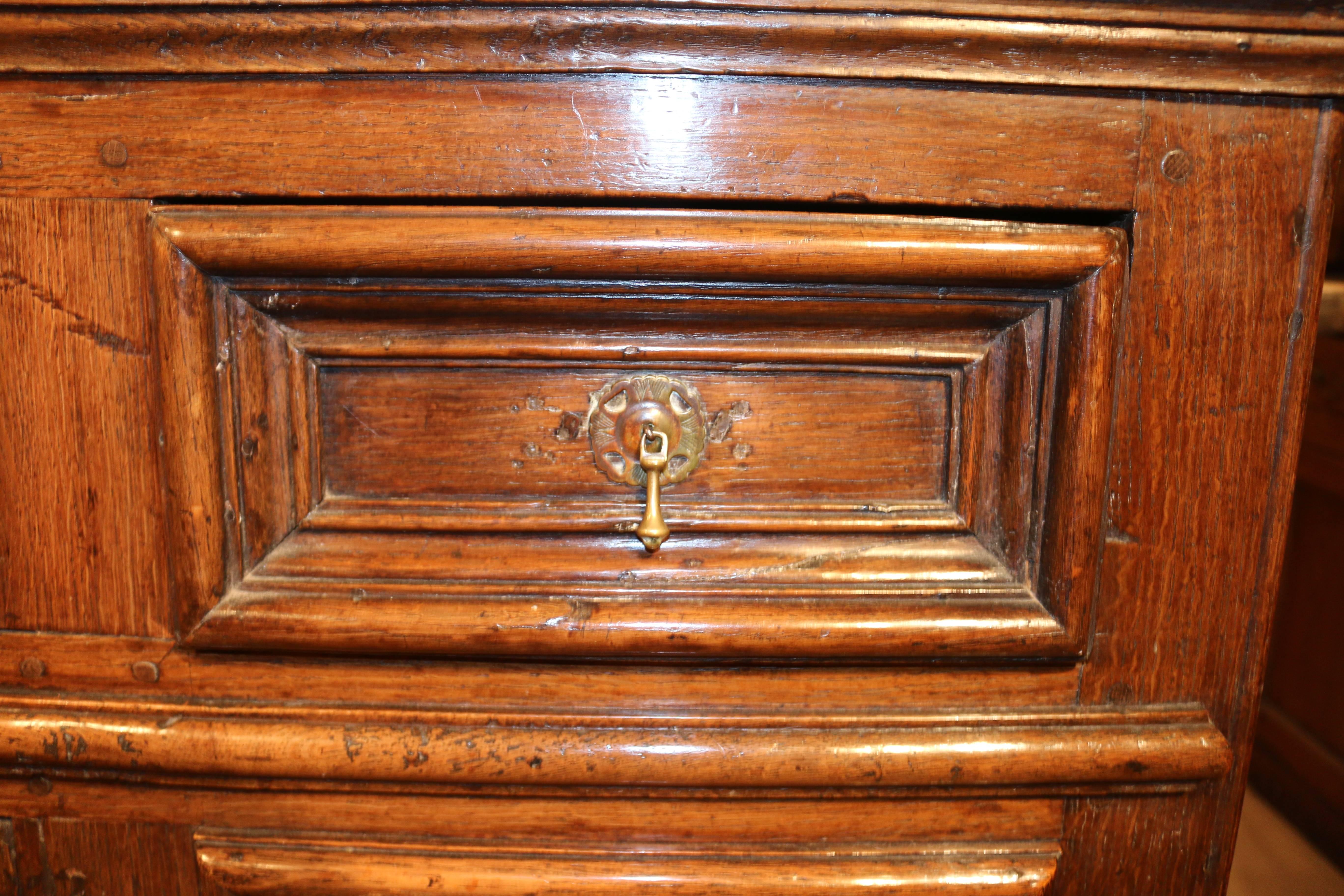 18th century narrow oak moulded dresser base, 1780

Dimensions
94 inches (239 cms) wide
18.5 inches (47 cms) deep
40 inches (102 cms) high.


   