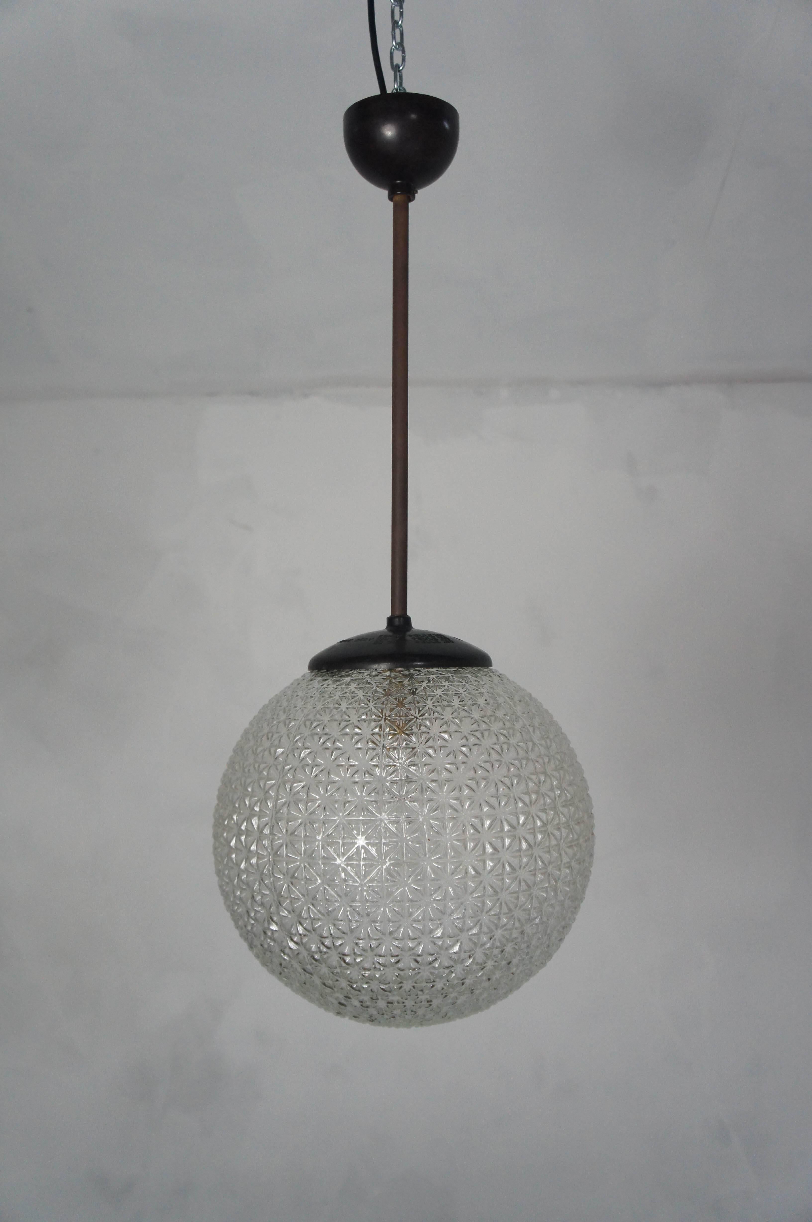 Fantastic pair of midcentury glass globe lights featuring bakelite gallery.
Wired and ready to hang.