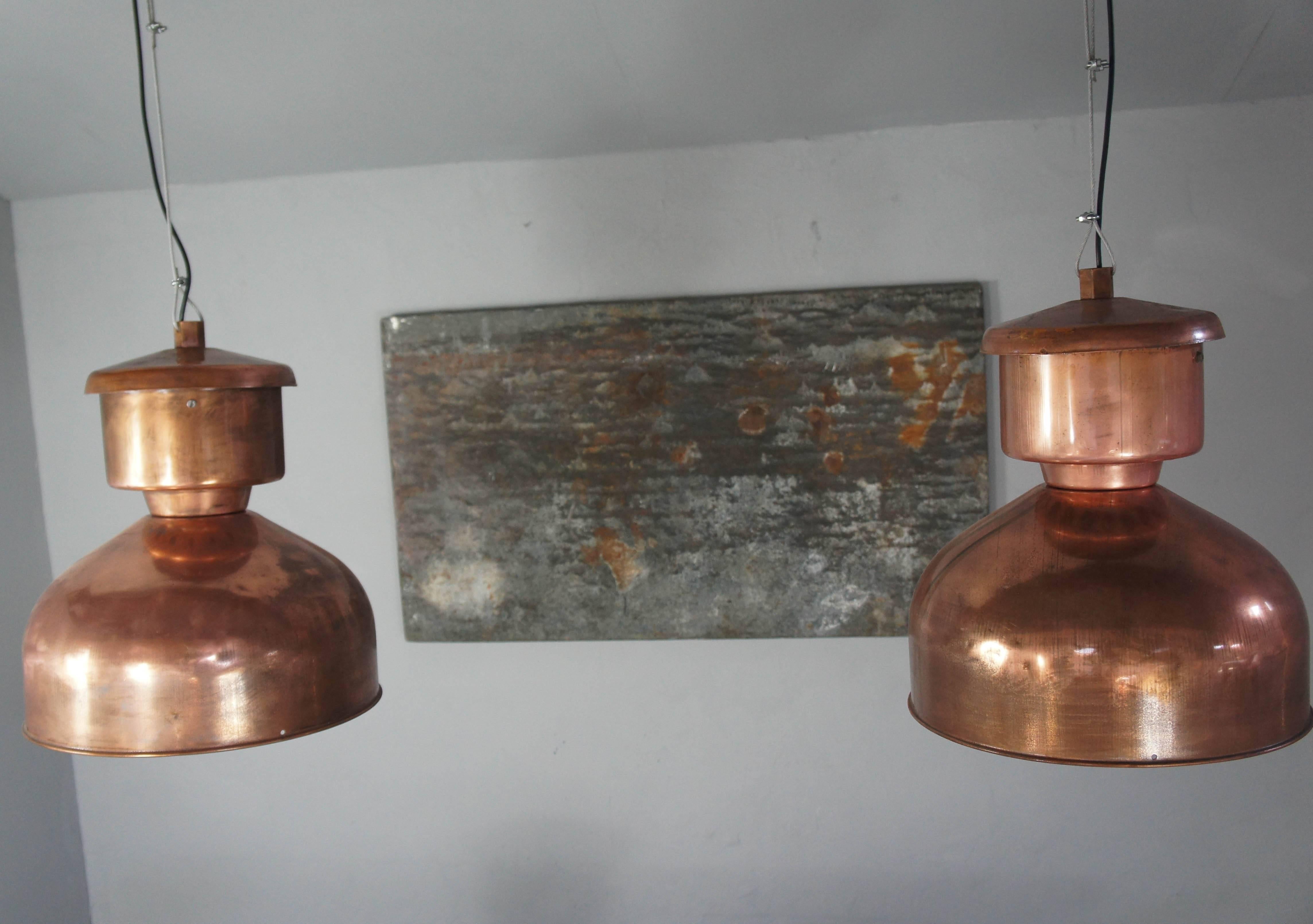 Large pair of original factory copper pendant lights from the Netherlands. Wired and ready to hang.