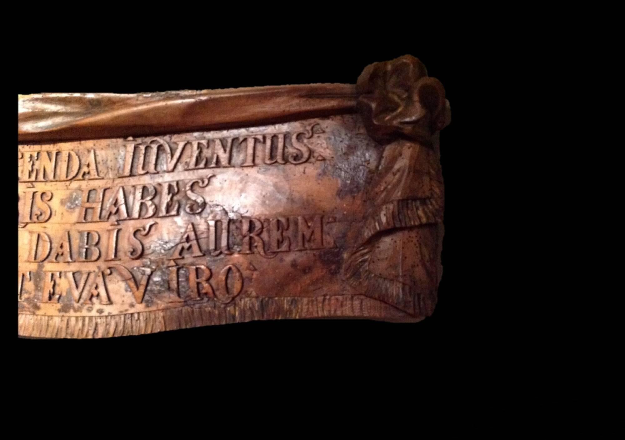 Late 18th century wood sculpted religious panel with Latin text.
Measures: W 156 cm H 31 cm.