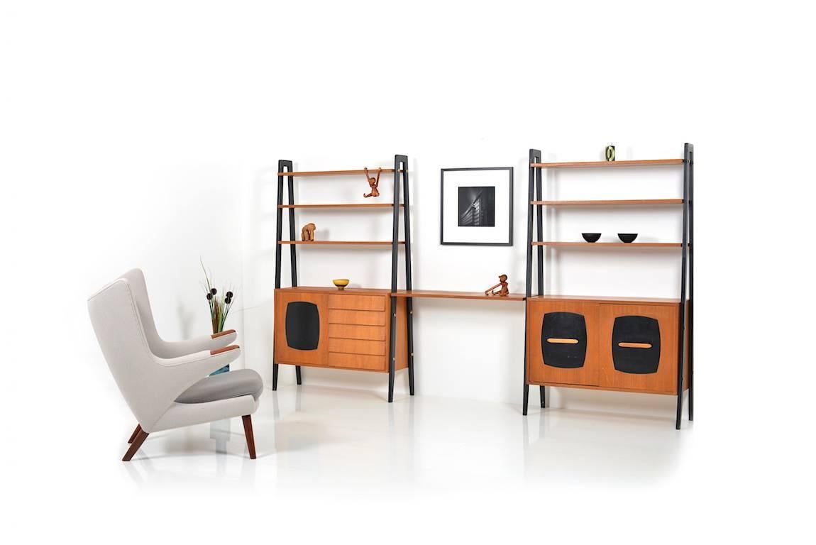 Early bookshelf by Gillis Lundgren for Ikea. Made in teak and black applications. Beginning of 1950s.