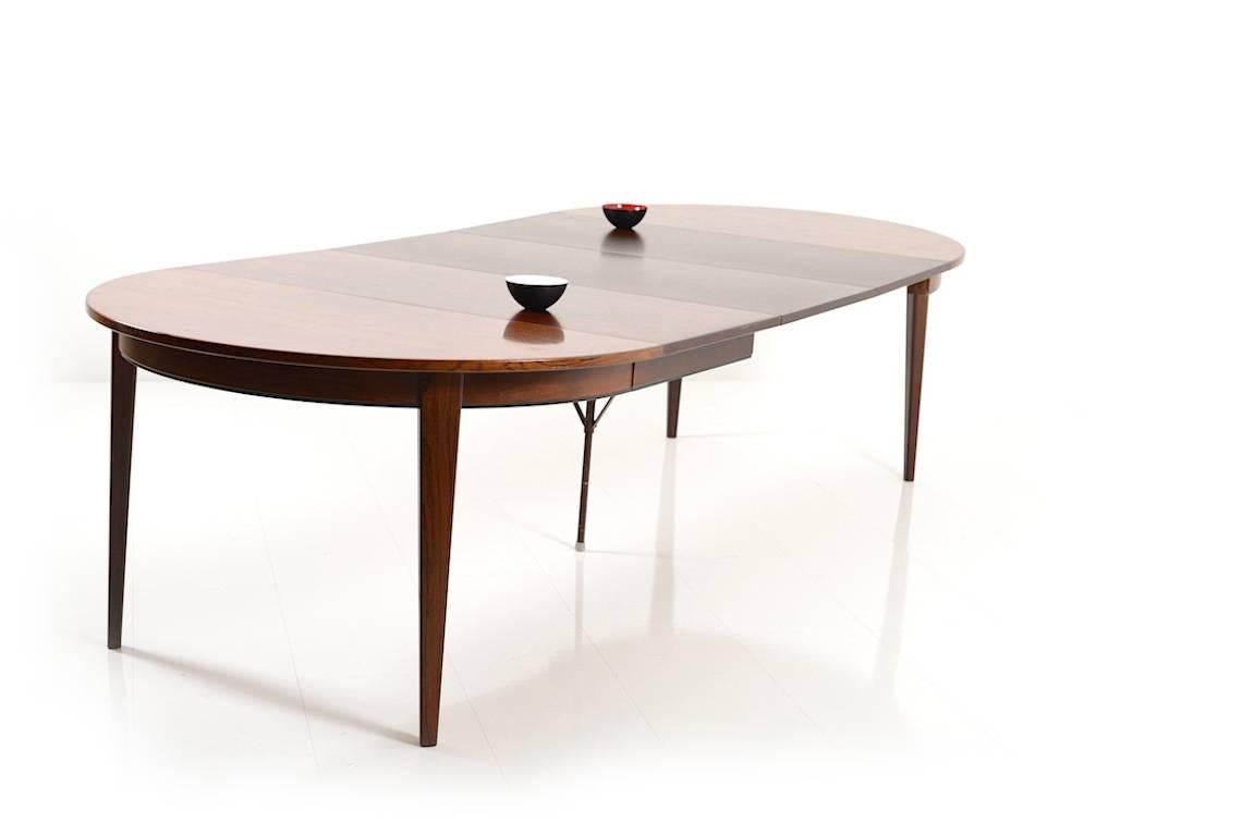 High quality dining table by Omann Jun. Model 55. Design by Gunni Omann. Table can be extended with Three plates.
Size: 120.0 x 120.0 / 270 x 71.0 CM (D x W x H).