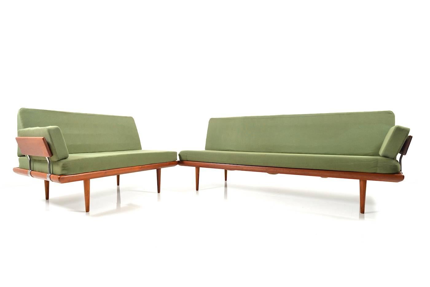 Three-seat sofa/daybed by Peter Hvidt & Orla Mølgaard Nielsen. Model Minerva. Teak wooden frame with original cushions in green fabric. Manufactured by France & Son, 1960s. Cushions would have to be renewed. 

Size: Three-seat-75.0 x 190.0 x 80.0