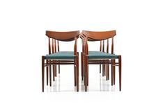 Set of Ten Mid-Century Teak Dining Chairs by Luebke