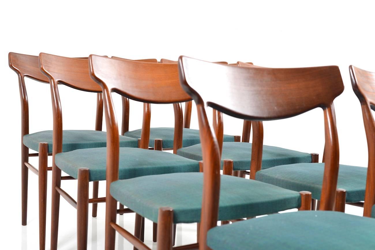 Fabric Set of Ten Mid-Century Teak Dining Chairs by Luebke For Sale