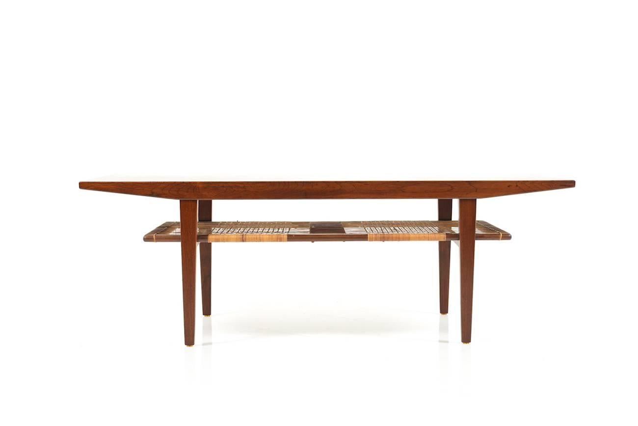 Fine Danish rosewood sofa table. Designed and manufactured early 1960s. Very good vintage condition.