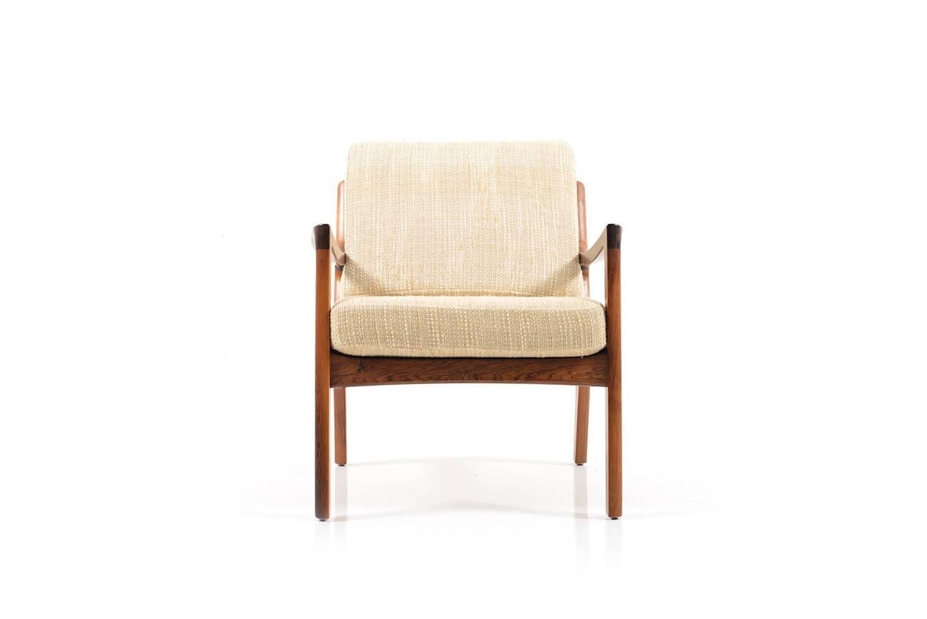 Rare Mid-Century rosewood easy chair by Ole Wanscher. Senator series. Manufactured by France & Son in 1960s. Original cushions in sand/creme fabric. The matching three-seat sofa and a pair of easy chairs is also available. Very good Danish quality.