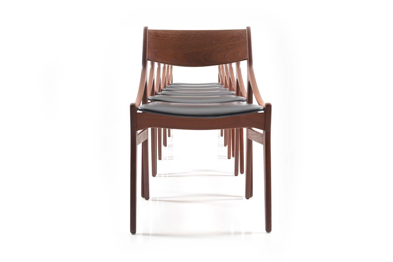 Set of six dining chairs in teak. Designed by H. Vestervig Eriksen. Manufactured Brdr. Tromborg. Seats in original black imitation leather.